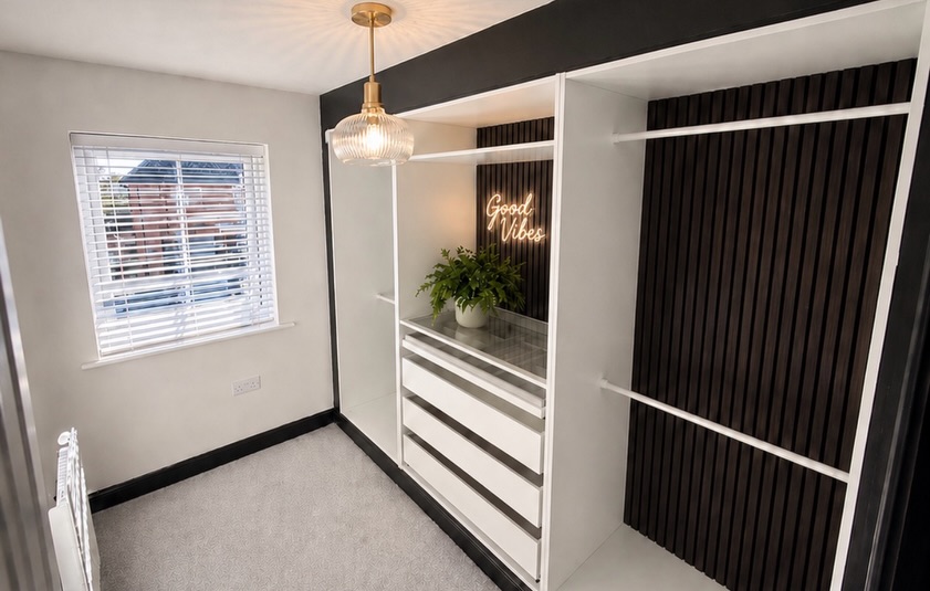 We’ve just completed these bespoke fitted wardrobes for a lovely customer @thomasevans1410 , creating a stylish open-plan dressing area with a modern boutique feel. Finished in a crisp white design with contrasting black framing, soft-close drawers, and statement acoustic panel backboards to add warmth, texture, and that premium custom-built look.
The centre feature section with glass-top drawers, mood lighting, and décor shelf turns everyday storage into a real focal point 👌
Designed, built and fitted to maximise space while giving this room a completely new purpose.
📍 Installed for another happy customer
🌐 www.rsmhome.co.uk
📩 Message now for a free home design visit & quotation
#cheshireinteriors #newbuildinspo #BuiltInWardrobes #NantwichInteriors #RSMHome