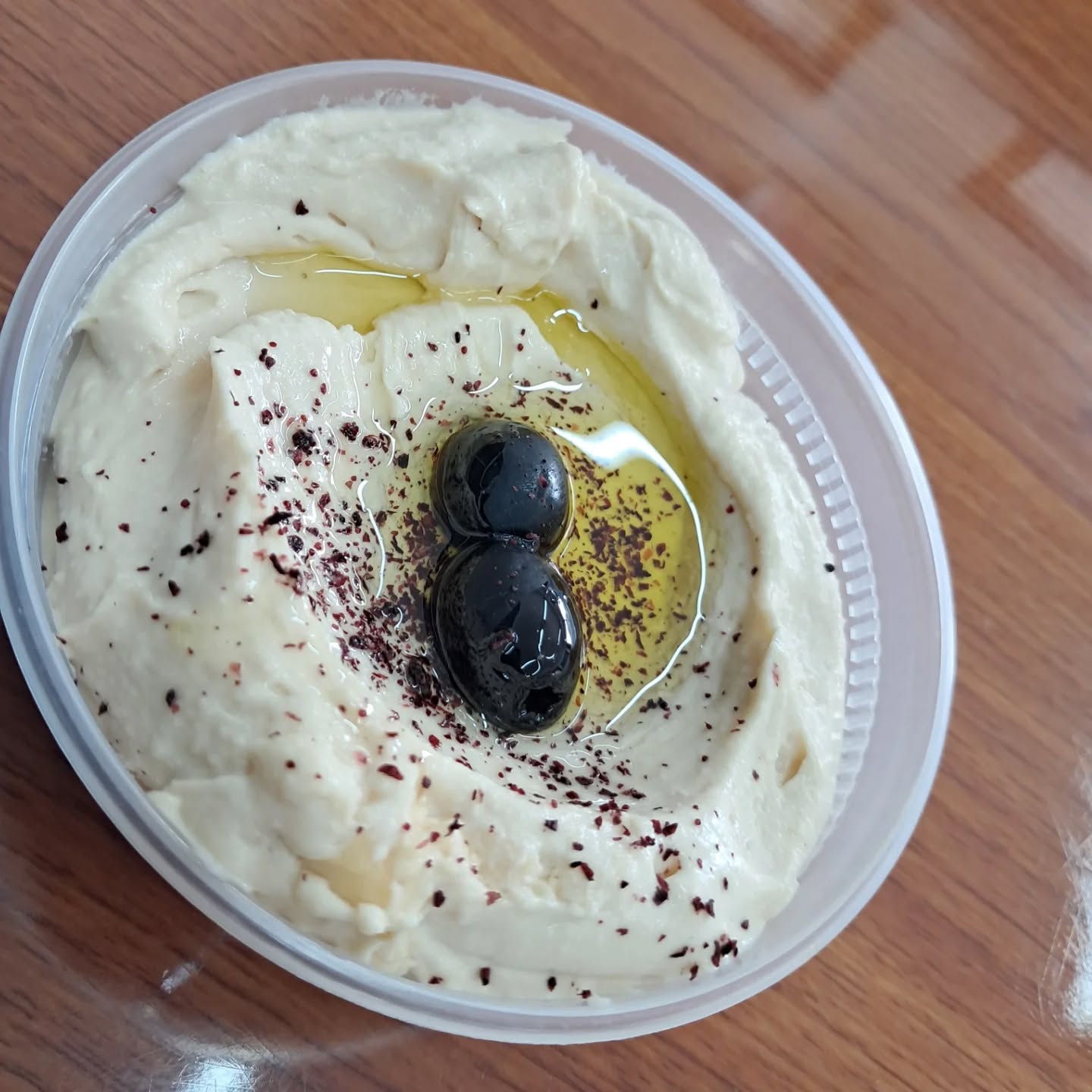 Heavenly Hummus from @fattoushlincoln
My thanks to @yomuchacho for the nudge to go back to Fattoush and get the hummus. WOW this is good, excellently balanced with its olive oil blessing on top then...THEN...puffy warm (possibly made to order) bread that just slammed this home AND for about $5, all day...all day.
I also got the chicken biryani and that was a big plate of delicious and I just couldn't stop eating, what a good lunch.