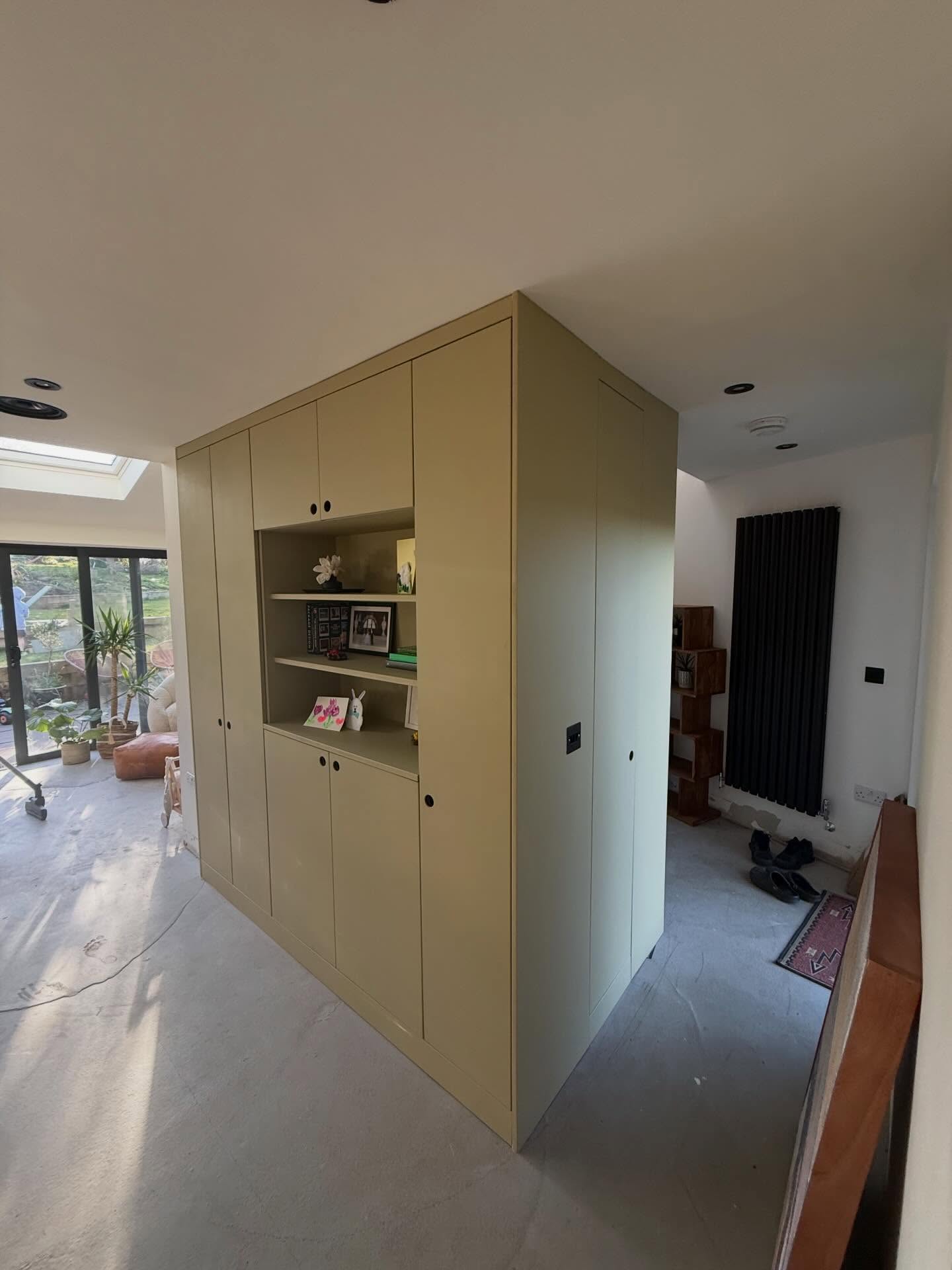 Custom designed and built MDF storage built into a main feature of this house in Dronfield #customjoinery