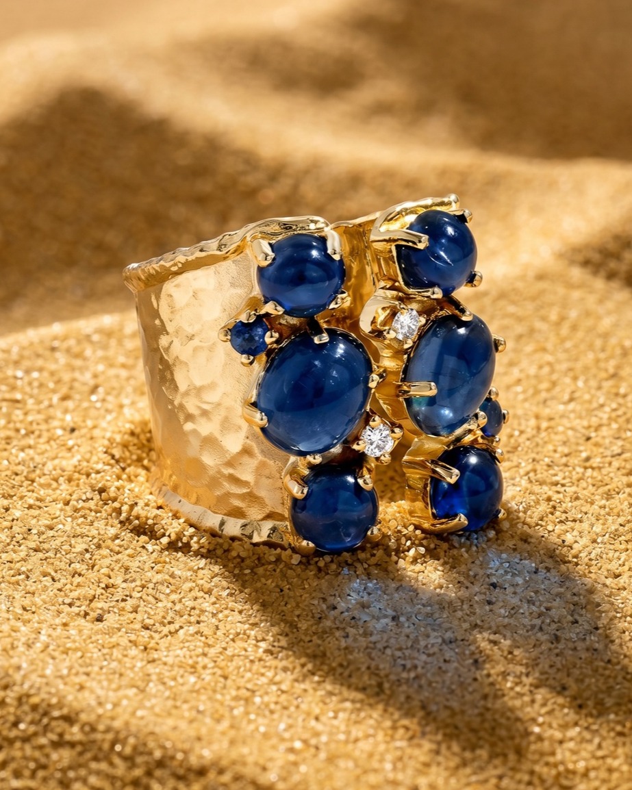 A modern treasure made by hand. ✨
The rich organic texture of the gold catches the light like sun on sand!
This handcrafted hammered yellow gold ring is set with luminous kyanite, deep blue sapphires, and brilliant white diamonds
#HandmadeJewelry #YellowGoldRing #KyaniteRing #SapphireRing #DiamondRing #FineJewelry #LuxuryJewelry #StatementRing #GoldJewelry #ArtisanMade #OneOfAKindJewelry #jewelrydesign #couturejewelry