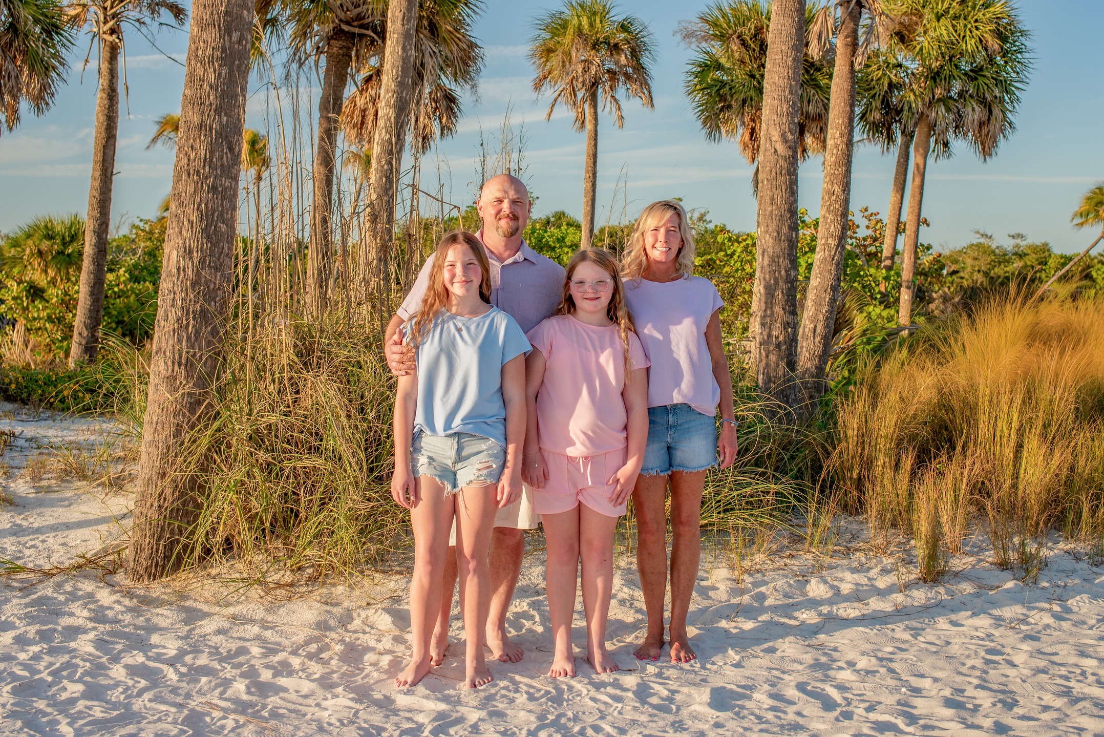 This beautiful family shared a photo session with another family, it worked out perfectly.