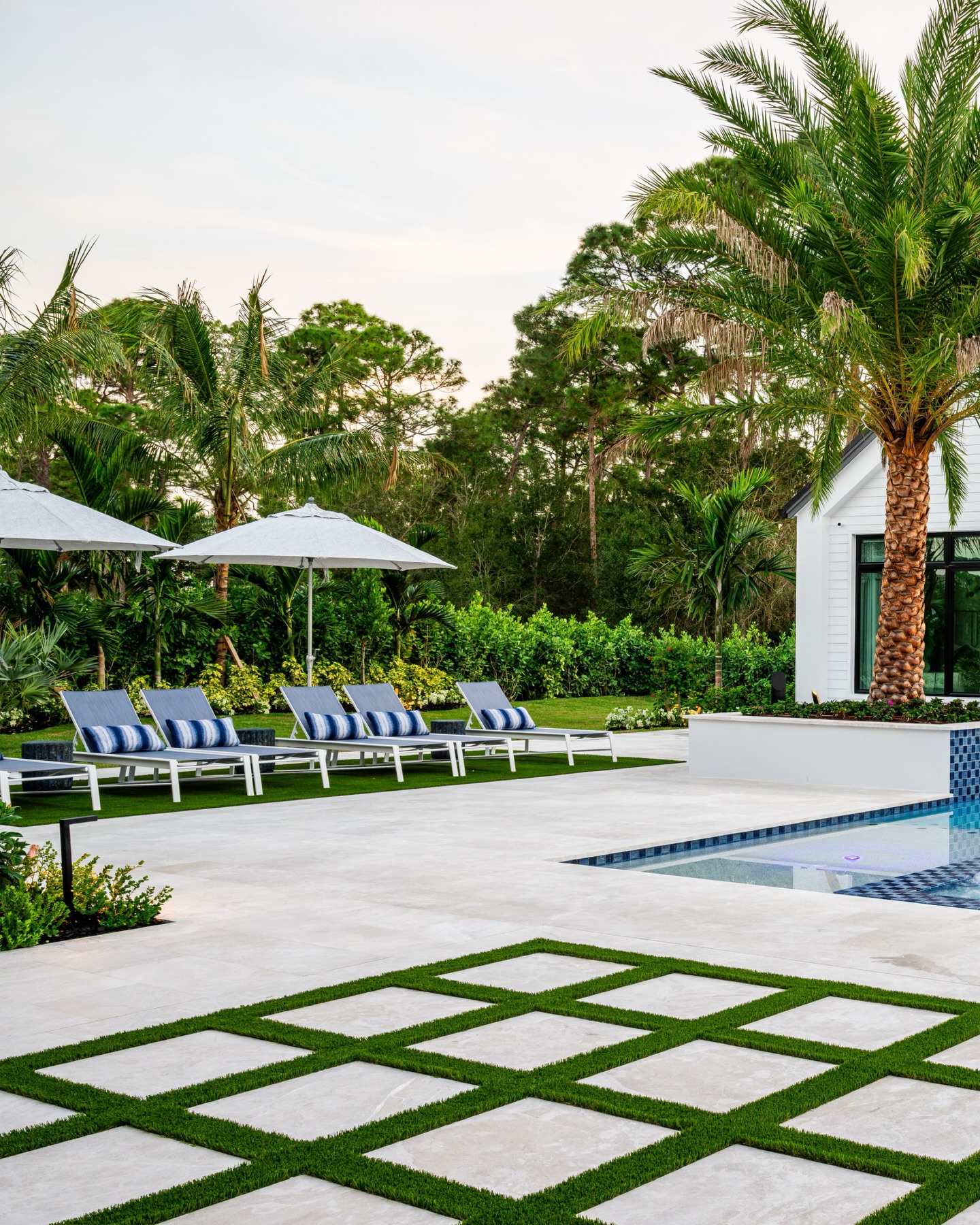 A private residence designed for the moments that matter most. Crisp architectural lines, glowing evening ambiance, a resort-style pool with integrated spa, and layered tropical planting create an outdoor setting that feels both elevated and effortless. Every detail was considered to turn home into a destination.
#NaplesFLDesign #LuxuryLandscapeDesign #OutdoorLivingFlorida #ResortStyleLiving #FloridaLiving