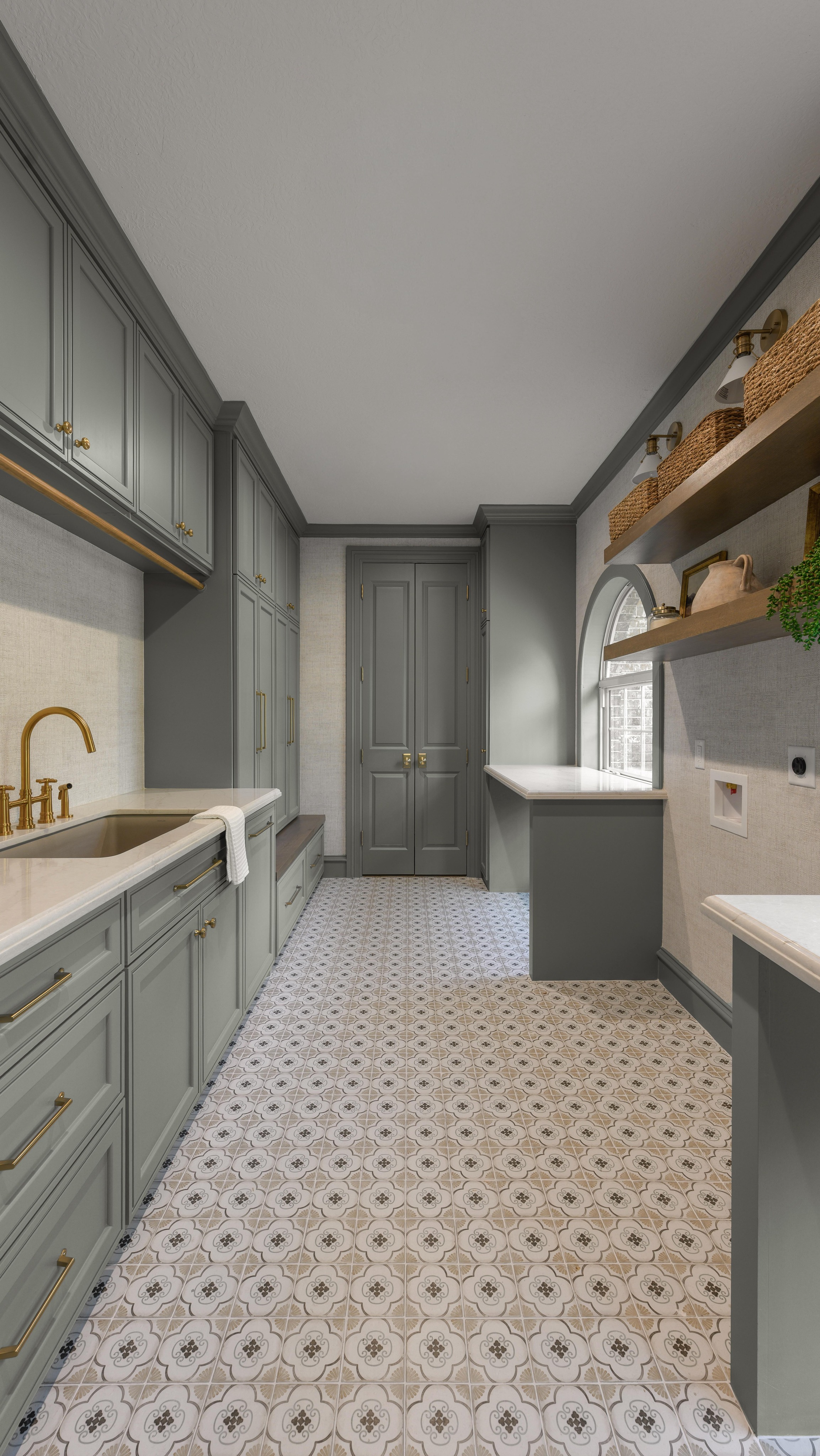 OBSESSING over this laundry room transformation at our French Blue Manor Project😍
Blowing out the wall and utilizing the extra garage space completely changed the game…what was once cramped and dated is now open, timeless, and so much more functional!!
Now it’s not just a place to do laundry… it’s a space our client actually enjoys spending time in🤍