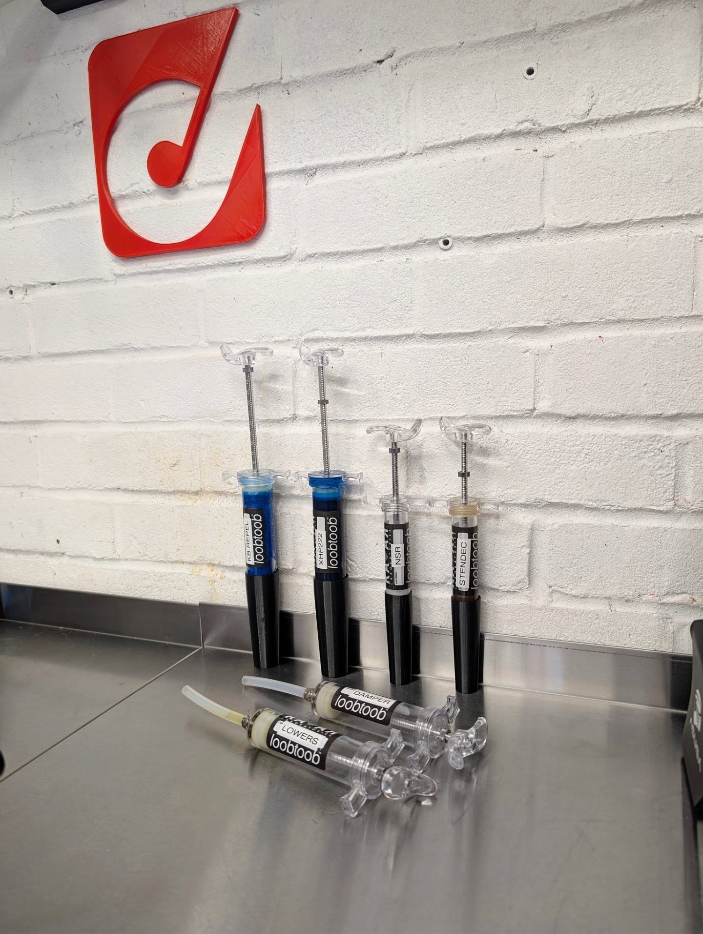 Posted a story on these a couple of weeks back and the response was enough to justify a proper post.
This isn't a sponsored post, these are products I've purchased and found them so useful, I wanted to share.
Loobtoob syringes from @radarlaboratories . Sounds ridiculous. Works brilliantly. Each one labelled for a specific fluid — fork lowers, damper oil, suspension grease, grease for builds. Each syringe can have different attachments depending on how you want to apply the product, and they can have caps fitted so they're stored cleanly and avoiding contamination.
Whether it's a full bike build, routine maintenance, or a suspension service, having the right fluid pre-loaded and clearly labelled removes one more friction point from the process (pun intended). No rummaging, no cross-contamination, no second-guessing.
It's one of those small things that makes a surprisingly big difference when you're deep into a job and need to keep moving.
It's certainly better than the three old tooth brushes that I may or may not have been using previously.
#datadrivendescents #engineeringspeed #maintenance #mtbmechanic #workshop