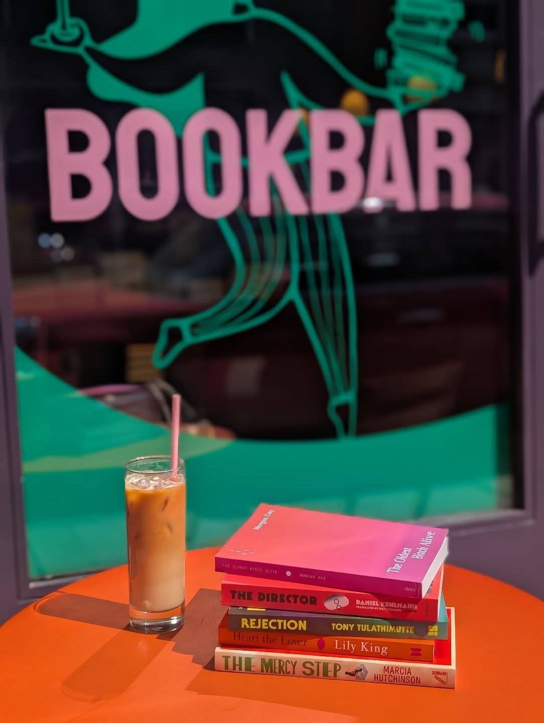 Brand new paperbacks to see you through the long weekend 📚☕🍷
📚 The Oldest Bitch Alive - the debut novel grapples with the meaning of life and terminal illness from the perspective of a French Bulldog.
📚 The Director - a team favourite from this year's International Booker shortlist, a German director who left Europe for Hollywood to resist the Nazis and then returned to his homeland with his wife and young son and began making films for the German Reich.
📚 Rejection - Tony Tulathimutte's astonishing, wild, jaw dropping stories will have you cringing gleefully. The whole team adored this remarkable collection.
📚 Heart the Lover - BookBar's 2025 Book of the Year and Women's Prize Shortlistee will have your weeping. It's the story of a student in a love triangle that will have an impact on their lives decades later.
📚 The Mercy Step - Our May BookClub selection and another Women's Prize Shortlistee, The Mercy Step follows Mercy from the womb through to the age of eleven as she navigates her violent father, and her relationship with the mother she adores. You'll be charmed by Mercy just as we were.
All come best served with a delicious iced coffee ☕ or glass of wine 🍷
We're open until 9pm Thursday-Saturday and until 6pm Sunday. BookBar Chelsea will be open as usual Bank Holiday Monday, and BookBar Islington will be closed as usual!
