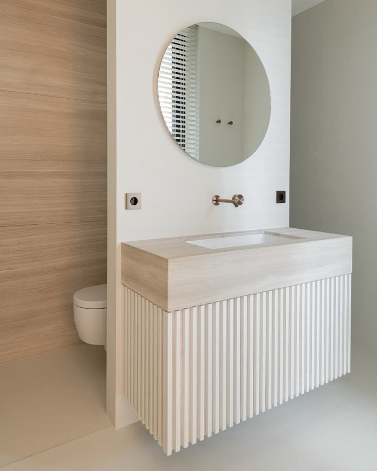 From sketch to visualization.
Material continuity and precise detailing shape this minimal, cohesive bathroom.
The space is structured around a central dividing wall, integrating the custom vanity as an architectural focal point.
Subtle textures and a restrained palette create a calm, balanced atmosphere where every element feels intentional.
Project designed in collaboration with @sphere_concepts
#interiordesign #bathroomdesign #minimalinterior #materialpalette #bespokedesign