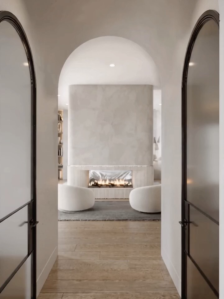 A quiet moment within the master suite â¨
This cozy sitting area was designed to feel like a private retreatâsoft textures, warm wood tones, and a sculptural fireplace framed through an arched entry.
A space to slow down, unwind, and simply beâŚ