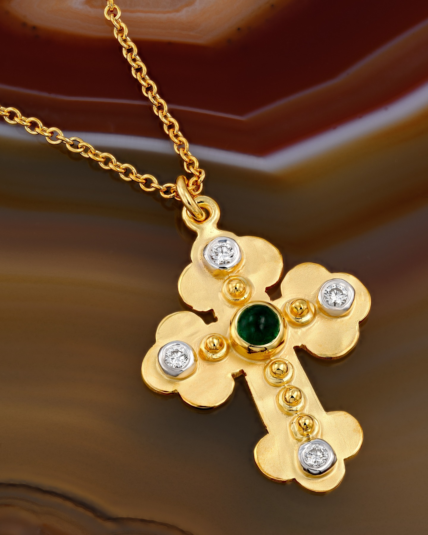 Every curve, every polished edge, every golden bead is thoughtfully finished by hand, revealing the beauty of true craftsmanship in even the smallest details.
meticulously sculpted in rich gold, centered with a deep emerald, and adorned with brilliant diamonds that bring light to every detail.
#FineJewelry #LuxuryJewelry #GoldCross #EmeraldJewelry #DiamondPendant #HandcraftedLuxury #ModernHeirloom #HighJewelry #Craftsmanship #MadeByHand #timelesselegance #gold #goldjewelry #couturejewelry