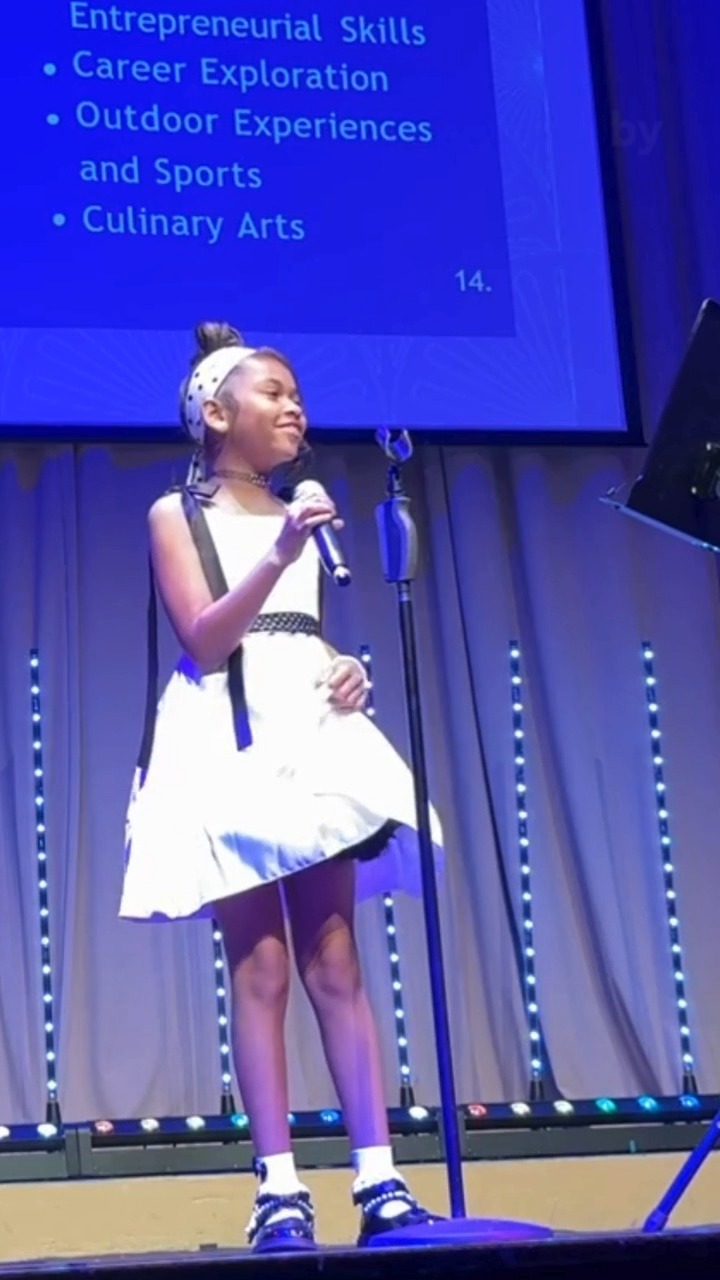 5th grader Meelah Mason captivated the audience with her remarkable voice during Purple with a Purpose: Harlem Nights.
Moments like this are exactly why Purple with a Purpose exists, to help fund opportunities for students to develop and cultivate their gifts, build skills and confidence, and access new experiences that expand their sense of what’s possible.
Thank you for supporting our students!