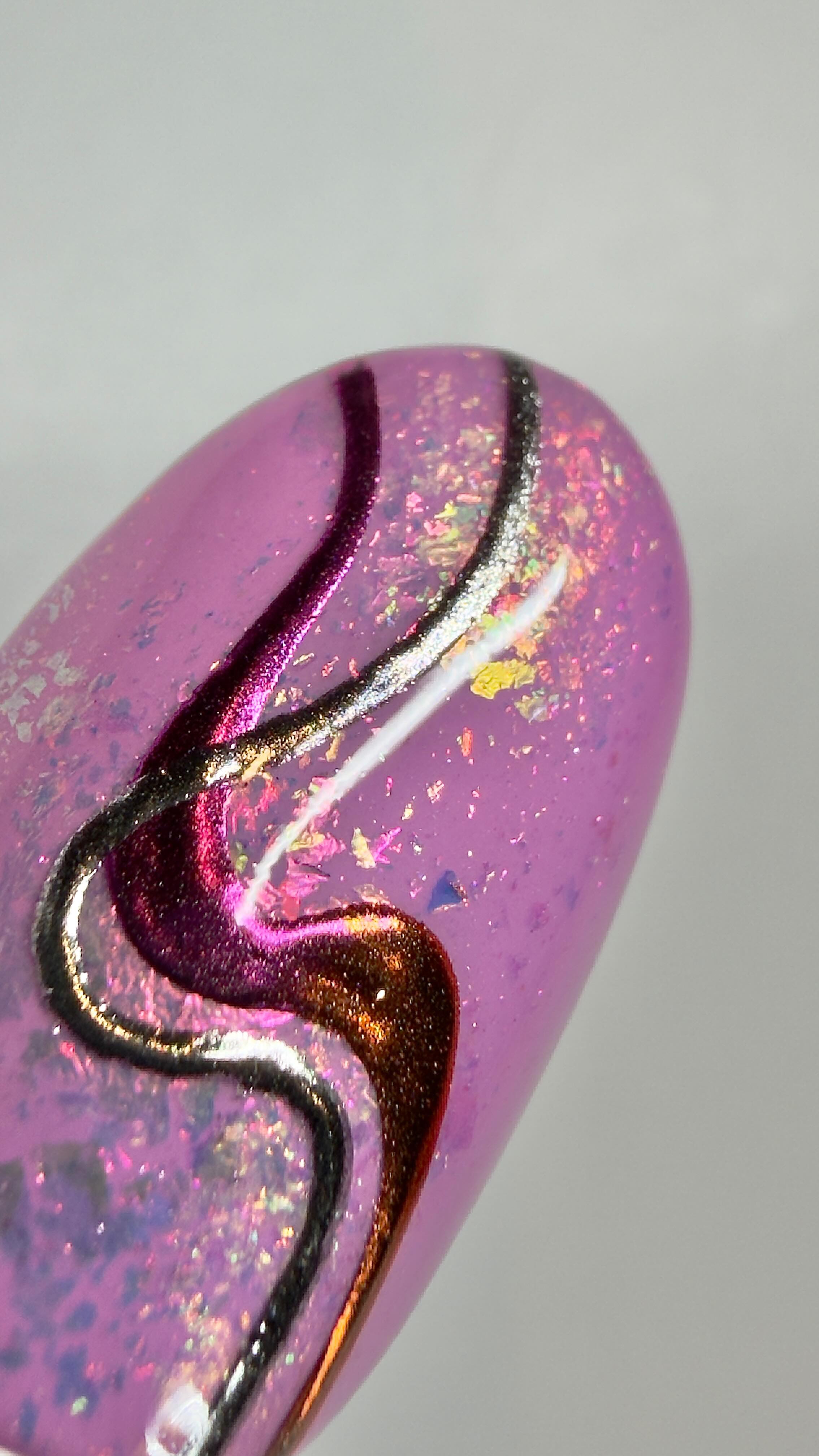 You seem to enjoy the isolated chrome nail art videos so here is another. Little bit of flakes and an isolated chrome swirls. #nailart #chromenails #chromenailart #isolatedchromenails