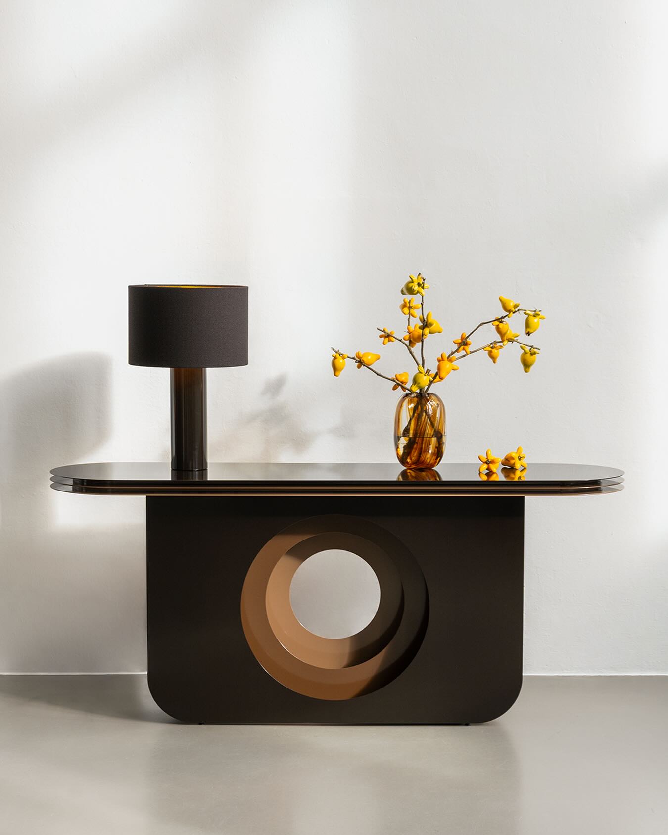 MY AMI sideboard & ALL ROUND Midi lamp
For 2026, we introduce Espresso: a deep black-brown with a warm, grounded depth.
The gradual colour triad of the MY AMI sideboard emphasizes the visual depth of the design. The ALL ROUND lamp follows the same monochrome logic and appears as if cast from a single mould. Its lampshade, covered in wool bouclé VIDAR 4 by Raf Simons for Kvadrat, gives the shade a tactile softness.
Handmade in Germany.
Links in bio.