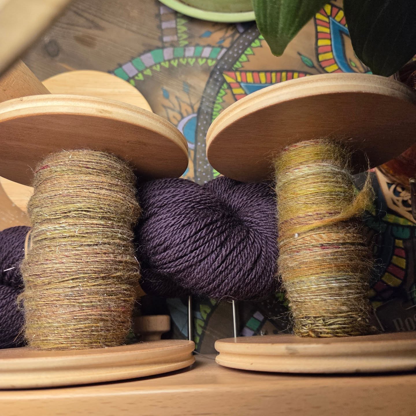 While writing the pattern for the bule hand-spun yarn, my mind is rushing forward to a new design 😄
I ordered some new interesting blends form @worldofwoolteam , this time it is has some silk, stellina and bamboo which I never tried - and it is wonderful to spin 😍😍😍 literally spins itself. I'm just there to hold and observe 🫠
It was a bit too gold for me, so I blended a matching bat to have one gold ply and two similar plies without the gold, and the result is gorgeous 🤩🥰 gives me India embroidery vibes for some reason.
It is drying now and I'll post a reel with the full process and recepie soon.
I have the perfect matching yarn for a royal elegant colorwork yoke - it's the Tandem yarn by @stephen.and.penelope , in the color Aubergine.
Now it'll wait until the blue vest is done, and I'm ready to start it. My mind is so much faster than my hands 🤣🤣🤣
#spinningForStash #HandspunYarn #spinningmyownyarn #KnitOfTheDragon #spinnersofinstagram