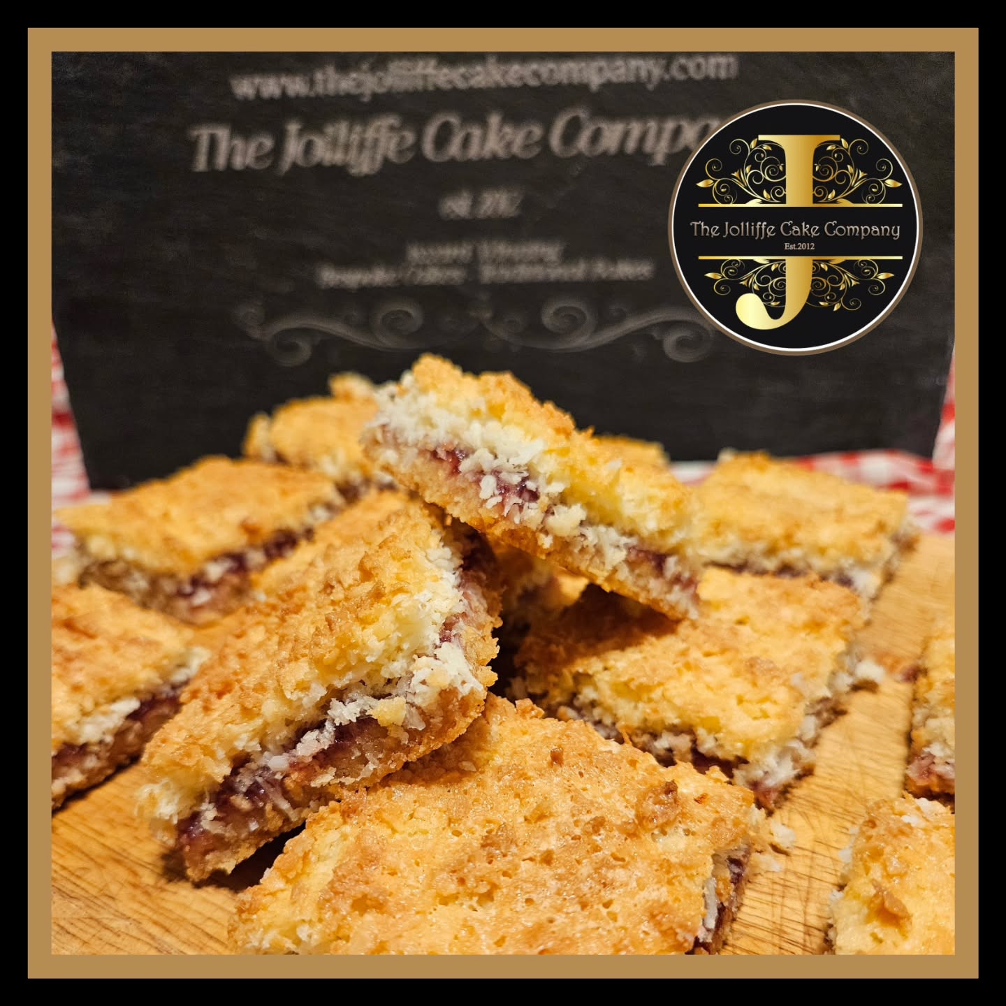 Newly added to our 'Retro Bakes' . COCONUT & RASPBERRY SLICE. Buttery, coconut shortbread base, a layer of Organic Raspberry Jam, topped with a chewy macaroon topping. Available as a box of 12 Squares, post anywhere in the UK or available for Collection ( via appointment) order via our website #retrobakes #bakesbypost #thejolliffecakecompany #woodleyberkshireuk