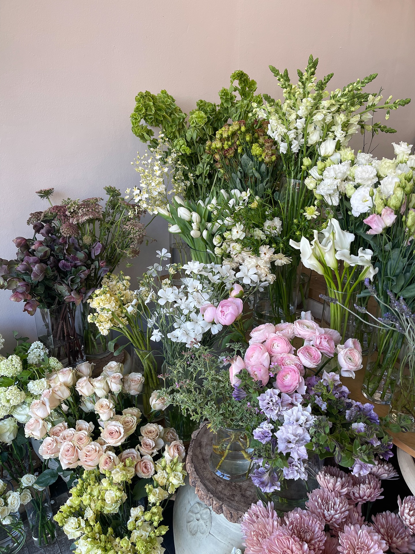 The shop. By this weekend it will be ten times this — every bucket full, every surface covered, every stem chosen for our client orders. Come see what Mother’s Day preparation looks like at Le Bouquet. Pre-orders still open at le-bouquet.com — link in bio.