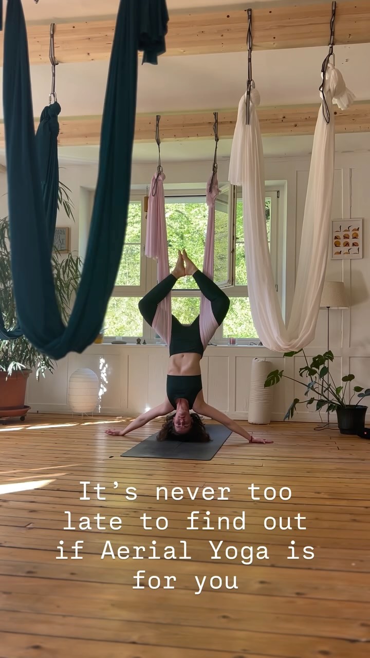 Beyond the joy of hanging upside down and reconnecting with that childlike freedom, aerial yoga and inversion practices offer so many additional benefits:
✨ Decompression of the spine – The hammock supports your body weight, allowing the spine to gently lengthen and decompress. This can help relieve back tension and counteract the effects of long hours sitting.
✨ Improved lymphatic flow – Inversions assist the lymphatic system, helping your body naturally detoxify and reduce fluid retention.
✨ Core and stabilizer strength – Even when it feels effortless and fun, your deep core muscles and stabilizers are constantly engaged to maintain balance and alignment.
✨ Joint mobility without compression – The silk supports your weight, allowing you to explore range of motion in hips, shoulders, and spine with less strain than traditional mat work.
✨ Nervous system regulation – Inversions can help reset the nervous system. Many students report feeling calmer, clearer, and more grounded afterward.
✨ Confidence and resilience – There’s something transformational about doing something that once felt intimidating. Each time you trust the hammock, you build trust in yourself.
✨ Play and creativity – In a world that often feels serious and structured, aerial yoga gives you permission to move differently, explore, and reconnect with joy.
It’s true — it’s not for everyone, and that’s okay. But if you’ve ever been curious… if you’ve ever wanted to feel lighter, freer, stronger, and more present…
This is your invitation.
✨ Come hang with us.
✨ Book your next aerial yoga class at : www.aureyoga.com
✨ Discover what happens when you let go — and lift off. 🧚
You might just find a part of yourself you didn’t know you missed. 😉