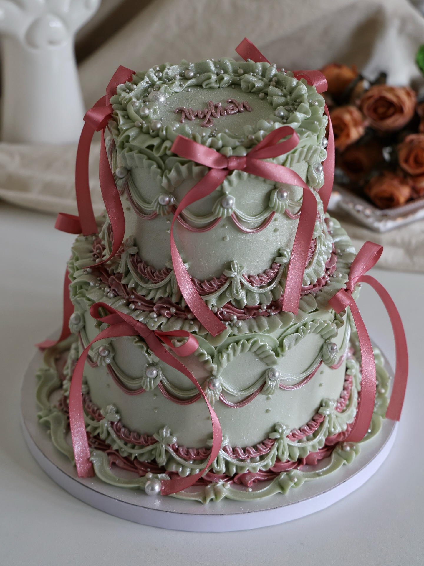 Ribbons, ruffles, and a touch of nostalgia. π©°β¨
Bringing the balletcore aesthetic to life with this vintage-inspired creation. The way the sage green frosting plays with the dusty pink ribbons is pure magic.
Save this to your mood board for your next celebration. πβ¨
.
.
.
.
.
.
.
.
.
.
.
.
.
.
#balletcore #coquetteaesthetic #ribboncake #aestheticcakes #dreamycakes