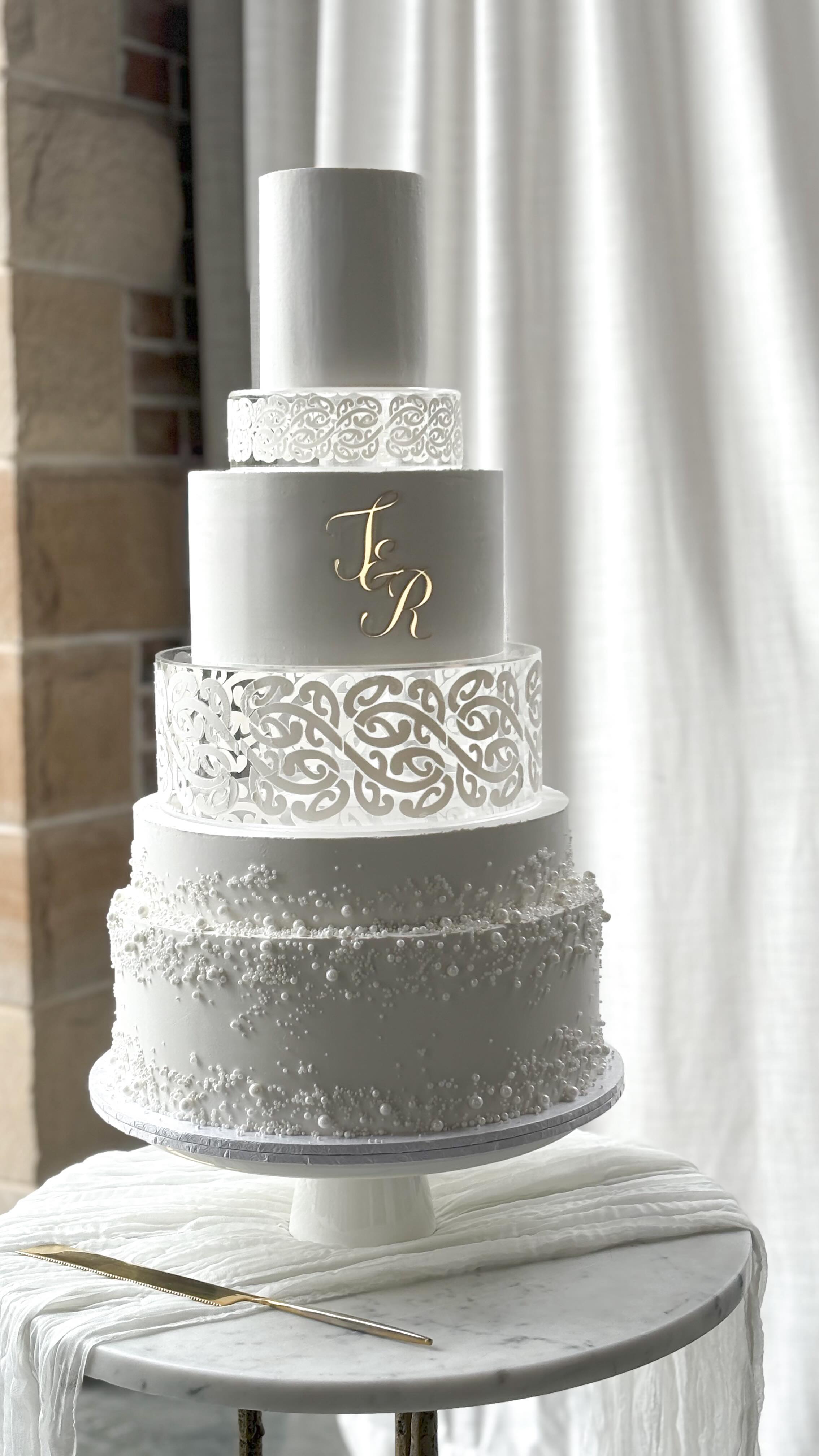 Finally getting around to posting this stunning wedding of Rochelle & Tyson ✨
So grateful that I had the absolute pleasure of creating a 6 Tier Wedding Cake, with creative freedom back in 2024 and mastering a new banana cake combo.
I am in awe of all the aroha that surrounded the bride and groom on their special day everything looked incredibly beautiful 🤍 (Happy 1 Year Wedding Anniversary for November!)
I was pregnant with my little pēpi Everleigh at the time, thank you to Taylah from @chaos_eventsau who helped me on the day with transport and the heavy lifting!!
Bride @rochelle_mumto6
Groom @tysonmckenna
Behind the scenes @craftandcapture.co
Venue @thevalleyestategc
Stylist @brisbane_event_decorators_
Māori Stencil @katibiccinz
Celebrant @judynetanasereneevents
Inspired by @_cakealchemy
#maoriwedding #goldcoastweddingcakes #kaikaicakery #maoriculture #maoriweddingcake
