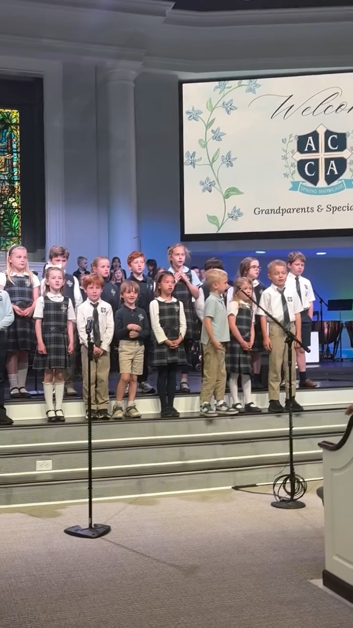 What a joy to welcome grandparents, parents, and special friends to campus for our Spring Showcase.
We loved sharing a glimpse into the work of the year—student artwork lining the hall, voices lifted in song, and minds on display through memory, recitation, presentation, and logic.
Our students blessed us in so many ways:
JK sang This Is My Father’s World
Kindergarten recited Are You My Mother? and Mother Goose rhymes
1st Grade delighted with biology poems
2nd Grade presented the Code of Chivalry
3rd Grade sang The Elements Song
4th Grade recited speeches by Winston Churchill
5th Grade shared selections from The Hobbit
6th Grade showcased a logical play
Grandparents and special friends play a unique and irreplaceable role in this work. You carry stories, wisdom, and faith that connect the past to the future. The hymns our students sing, the poetry they memorize, the cursive they practice, and the great books they read all reflect a vision of education that honors what has been faithfully passed down—while preparing them to live with courage and purpose in the years ahead.
And beyond all of that, you pray, encourage, and faithfully support not just these students, but their families.
Thank you. Your investment is part of a lasting legacy, and we are honored to partner with you in this meaningful work.
#grandparentsday #classicalchristianeducation #classicalchristianschool #truthgoodnessbeauty #alexandriavirginia