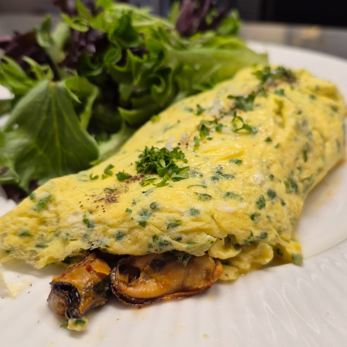 Omelette Special alert!! House smoked PEI mussels, slow braised onion, lemon thyme (from our garden) and Espelette pepper from @honestacrefarm