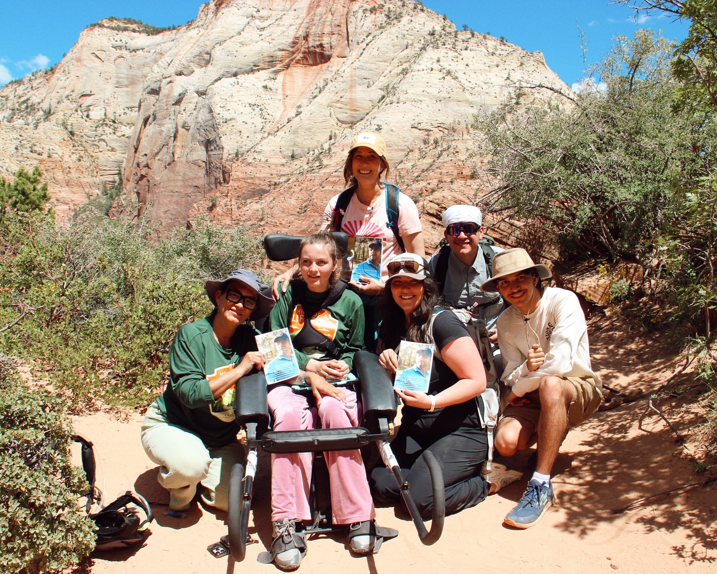 Today, we completed a memorial hike that none of us will ever forget.
On May 6, 2024, Scout Lookout in Zion National Park became the site of an unimaginable loss when Scott Backer suffered a fatal cardiac arrest while on a three generation family hike.
Exactly two years later, to the very minute, we had the honor of returning with his wife, Yesenia, their daughters Taylor and Brooke, and members of their family to the very place where Scott passed away.
Yesenia herself rode in a Rosie, alongside her daughter Brooke, who has Angelman Syndrome. Together, we made it back to Scout Lookout to remember, honor, and celebrate Scott’s life.
What unfolded on that Scout Lookout today was sacred. Tears were shared. Sweet memories were told. Laughter echoed through the canyon. Smiles broke through grief. In a place marked by loss, there was also peace, comfort, and love.
We at Luke5Adventures are deeply honored that this family trusted us to walk with them through such a meaningful and emotional day.
