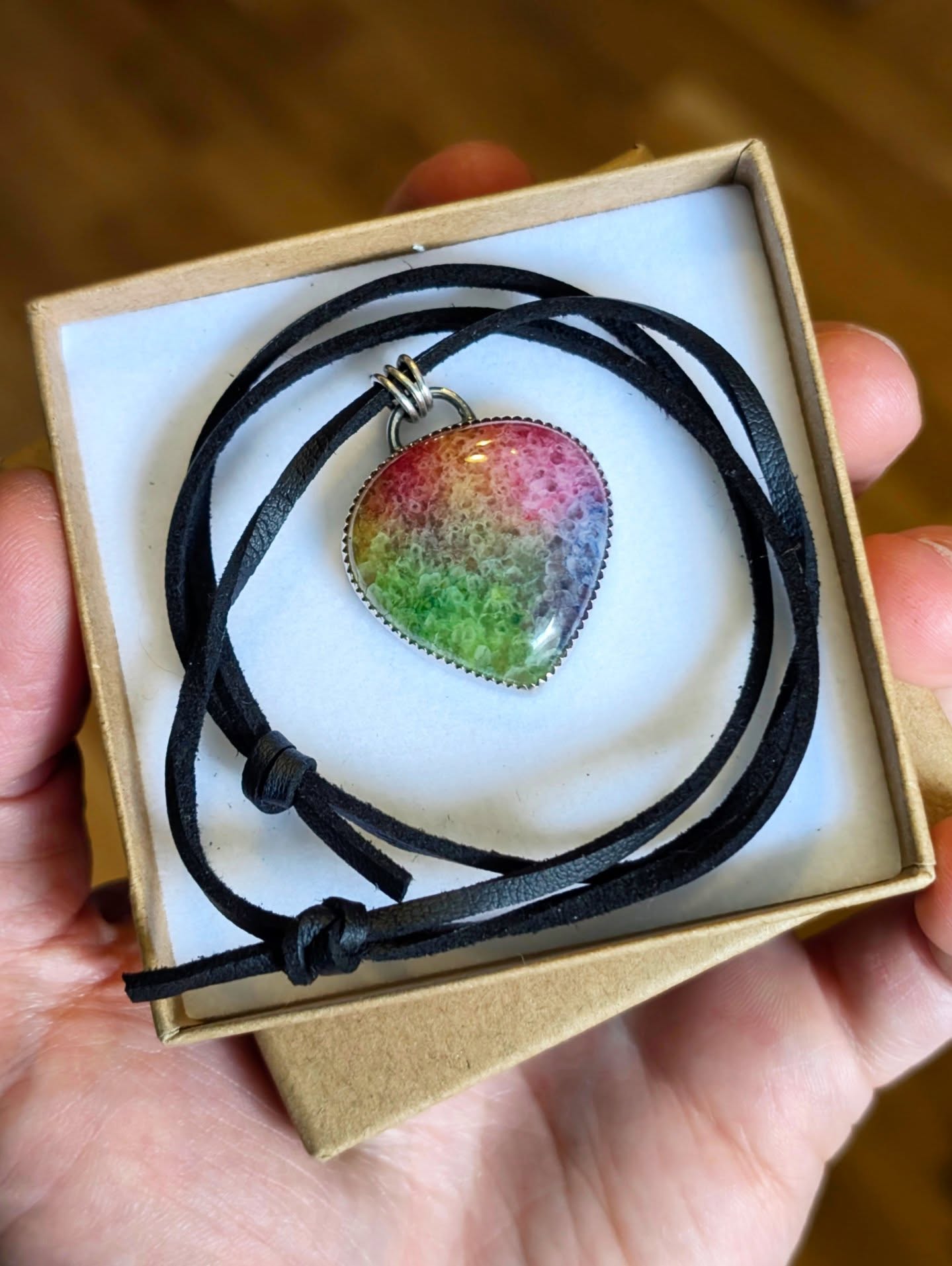 A large piece with a lovely story for the feed today
Today is my niece's 7th Birthday and this was her birthday present from me.
When she visited us last summer she saw my workshop for the first time and asked to make some jewellery with me - I of course was delighted and we decided to make her a necklace. She picked this Rainbow solar quartz stone (probably the biggest stone I had 🤣 - a girl got taste) from my collection and we got to the bench and started work on this together - me leading and her contributing wherever possible.
It of course didn't get anywhere near finished on the short visit but we'd made a start and it has sat patiently on my bench ever since.
In September when she started school all the kids were asked questions to write down the answer to and one of them was what she wanted to do when she was older. She put make jewellery...my little heart 😫
Earlier this year she then asked her mum 'i wonder what happened to that necklace we started' and I thought it was about time to get it finished for her.
Here it is all complete - I paired the finished piece with a leather cord for easy wearing and she was delighted to receive it.
Its so wonderful to be able to gift her this piece - something for her to treasure for years to come ❤️