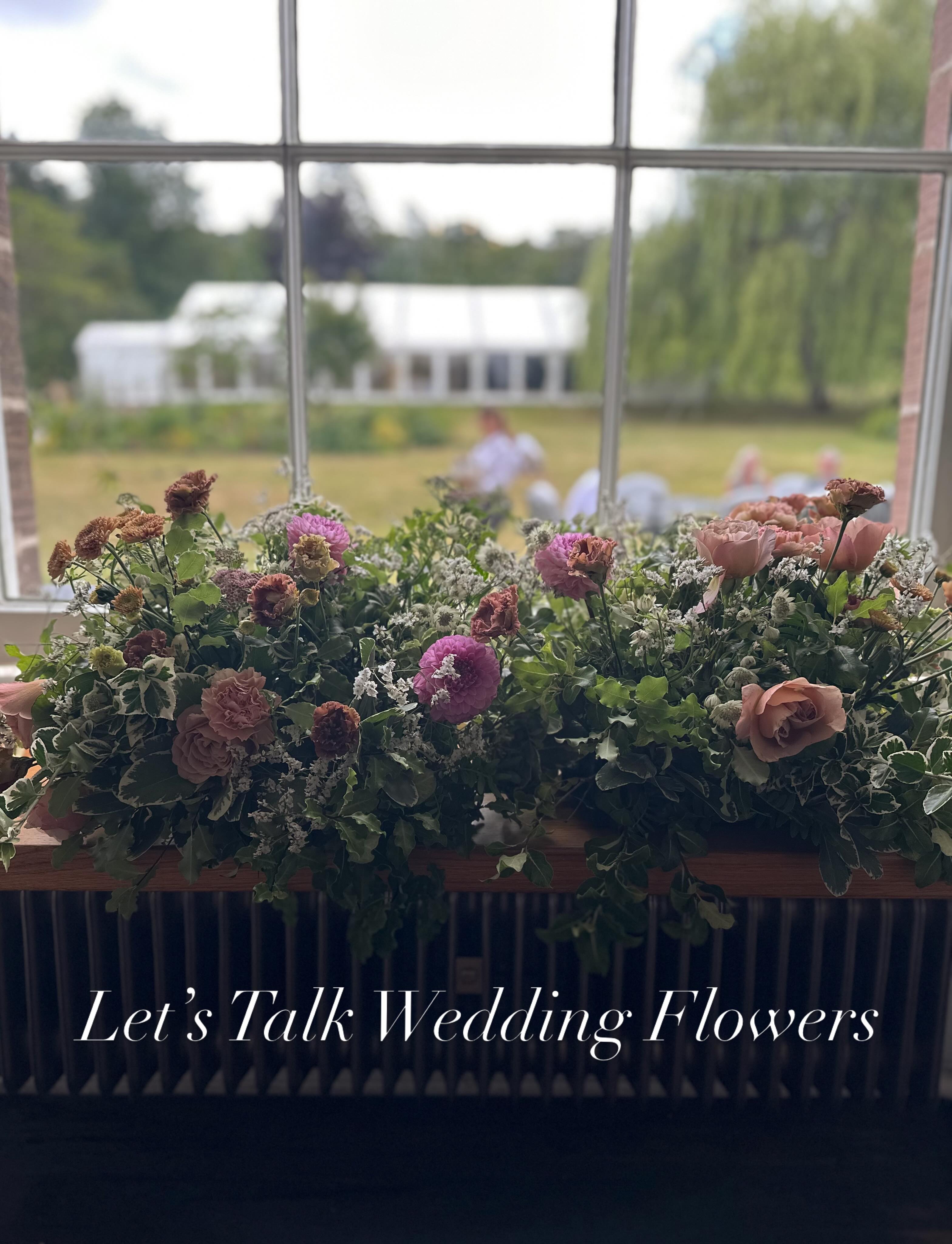 Wedding flowers are an investment and one thing I always encourage with wedding flowers is finding ways to maximise both your budget and your flowers throughout the day 🌿✨
The best way to do this? Reuse your ceremony flowers in the reception space. Not only does this make the most out of flowers it allows your designs to be seen & appreciated for longer throughout the day.
Large installations such as floral meadows, arches, urn arrangements, plinth designs, or floral clouds can all be moved and restyled around the reception — whether that’s at the entrance, cake table, bar, top table, or lounge areas.
Bud vases lining the aisle can later become table decorations, and bridesmaids’ bouquets can be placed into vases on reception tables to keep them fresh while doubling as décor.
Another great option is incorporating plants, especially hydrangeas, into installations. They’re often more cost-effective than individual stems, create lots of impact, and can later be replanted or gifted as favours.
Adding foliage like ivy, jasmine, eucalyptus, rosemary, or clematis also helps create fuller designs without overcomplicating the look.
Single verity flower installations can also be incredibly impactful. They feel timeless, elegant, and create a real wow factor without looking overly busy. These work beautifully as aisle meadows, mantle installations, altar designs, or staircase florals.
When planning wedding flowers, it’s never just about adding more — it’s about designing intentionally, styling thoughtfully, and making every flower work beautifully throughout your entire day ✨