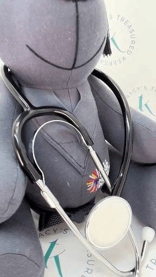 When Chris asked me to create a bear from his daughter's student doctor scrubs to celebrate her graduation, complete with graduation cap and stethoscope, I knew we'd craft something truly special.
Years of studying, exams, placements, and dedication, all represented in this bear dressed in the scrubs she wore throughout her training. The graduation cap and stethoscope add the perfect finishing touches to mark this incredible achievement.
From student to Doctor. What a proud moment to preserve!
#TracysTreasuredKeepsakes #SmallBusinessUK #PersonalisedKeepsakes #HertsCustomKeepsakes #HandmadeGiftsUK