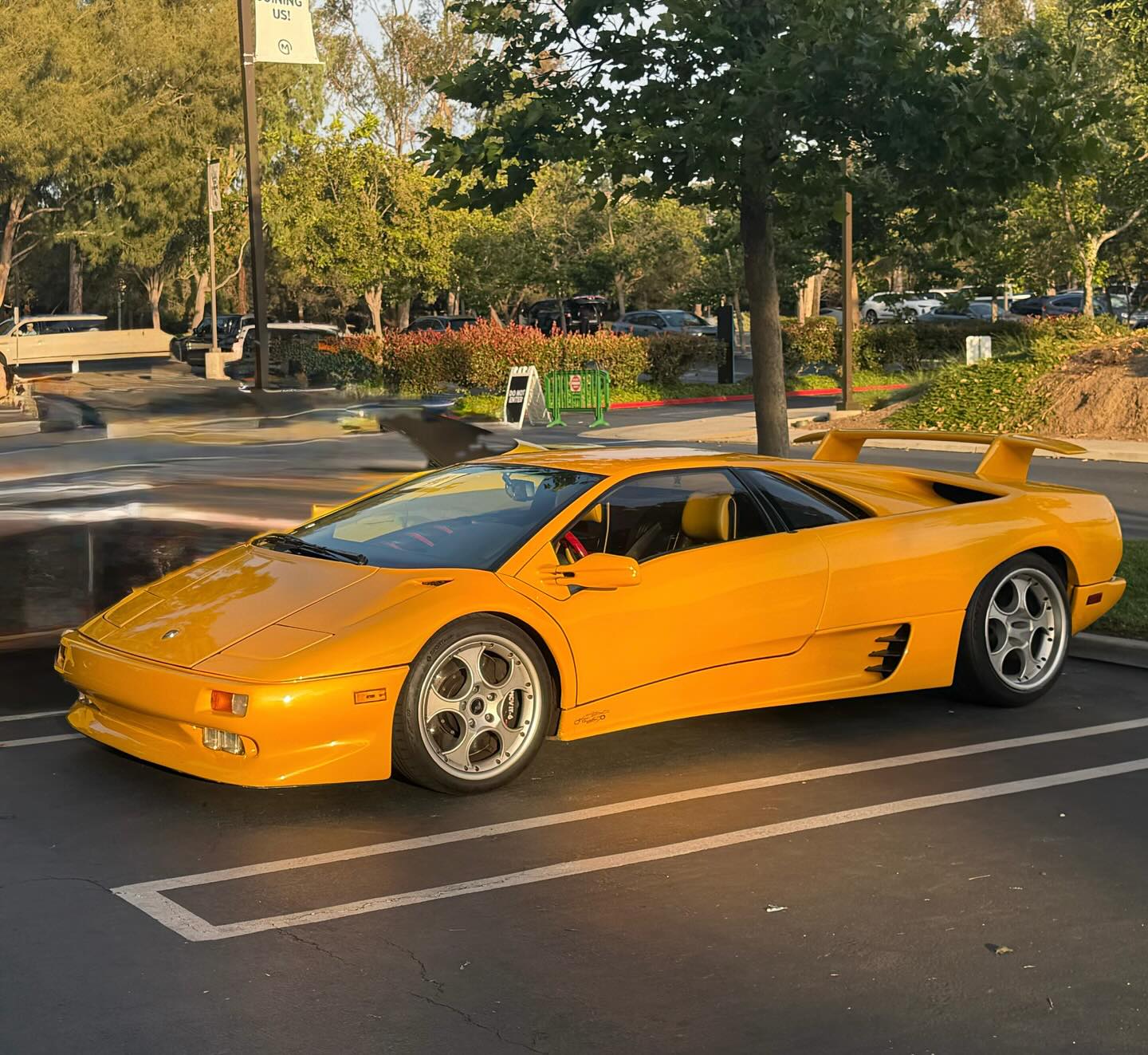 You guys thought you would never see this. A Lamborghini post on my page. Well, there is a funny story. This is my buddy's ride @doctordorado and every time I see his car, it reminded me of a story. When I was 16 years old, I had a Lamborghini countach poster on my wall. It was my dream car and my motivation to make enough money so that one day I could own one. (My other dream car was the 288 GTO) anyways, I worked really hard and by the age of 30, I was able to afford a pre-owned 1992 Lamborghini Diablo VT like this one here. That was the year my dream came true and the year my dream was broken because in those days, Lamborghini was quite tempi-mental. When I push the car, the warning lights would come on every time. I bring it to the shop and when I got it back, the lights were off until I pushed the car again and the warning lights would come back on. After 6 months of this, I was sick of it. (Thinking back I might have been unlucky and bought a bad one) but I remember driving it down to Ferrari of Costa Mesa and trading it in for a pre-owned F355 spider Red on Tan as you would expect for my first Ferrari. So the joke is from the Ferrari community. Thank goodness that the Lamborghini I bought was not so good because if not, I might be today @lamborghinicollector_davidlee :))))))
