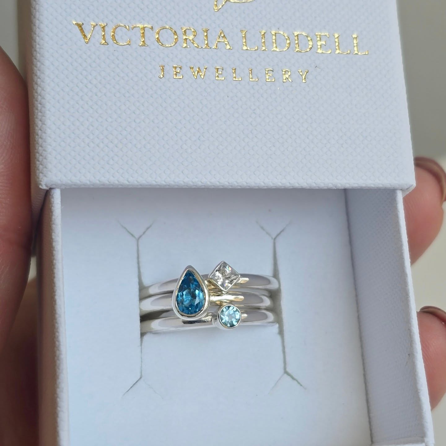 This commission of my new Signature Ring Set was all about the blues 💎
A set of three gemstone stacking rings, designed to be worn together in perfect harmony or styled individually for effortless everyday elegance.
This set features a pear-cut gemstone, a Diamond shape, and a round gemstone—three unique stones.
Whether chosen to represent loved ones, special moments, or simply your favourite colours, each Signature Ring Set tells a story that’s uniquely yours.✨️