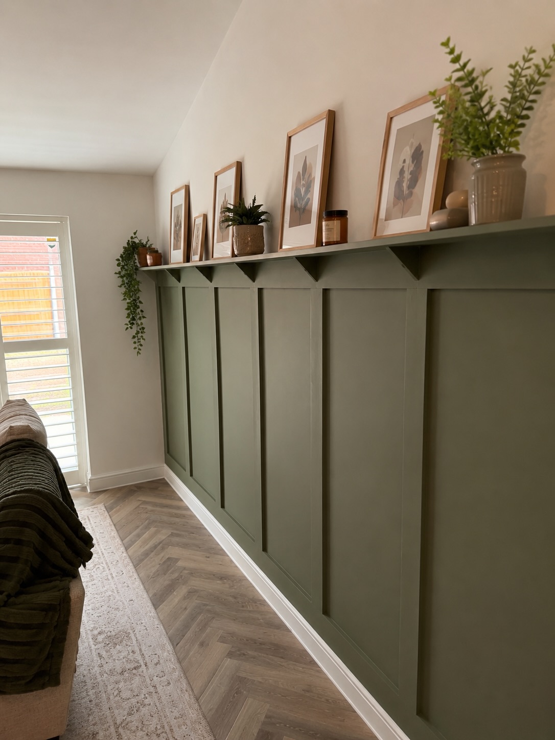A simple wall transformed into a premium shaker-style feature with a bespoke floating shelf and styling details to completely change the feel of this living space in Shavington.
The deep olive tone paired with the warm oak shelf creates a modern, calm interior look that’s massively trending right now — timeless, clean and high-end without overpowering the room.
We finished this one with evenly spaced shaker panelling, decorative shelf brackets and styled shelving to give it that interior-designer finish ✨
Send us a photo of your wall/space and we’ll help design something bespoke for your home.
Designed, built and fitted by RSM Home.
📍 Installed today in Shavington, Cheshire
📩 Message us for feature walls, panelling, media walls, shutters, fitted furniture and full room transformations
🌐 www.rsmhome.co.uk
#shavington #NantwichHomes #FeatureWallDesign #CheshireInteriors #RSMHome