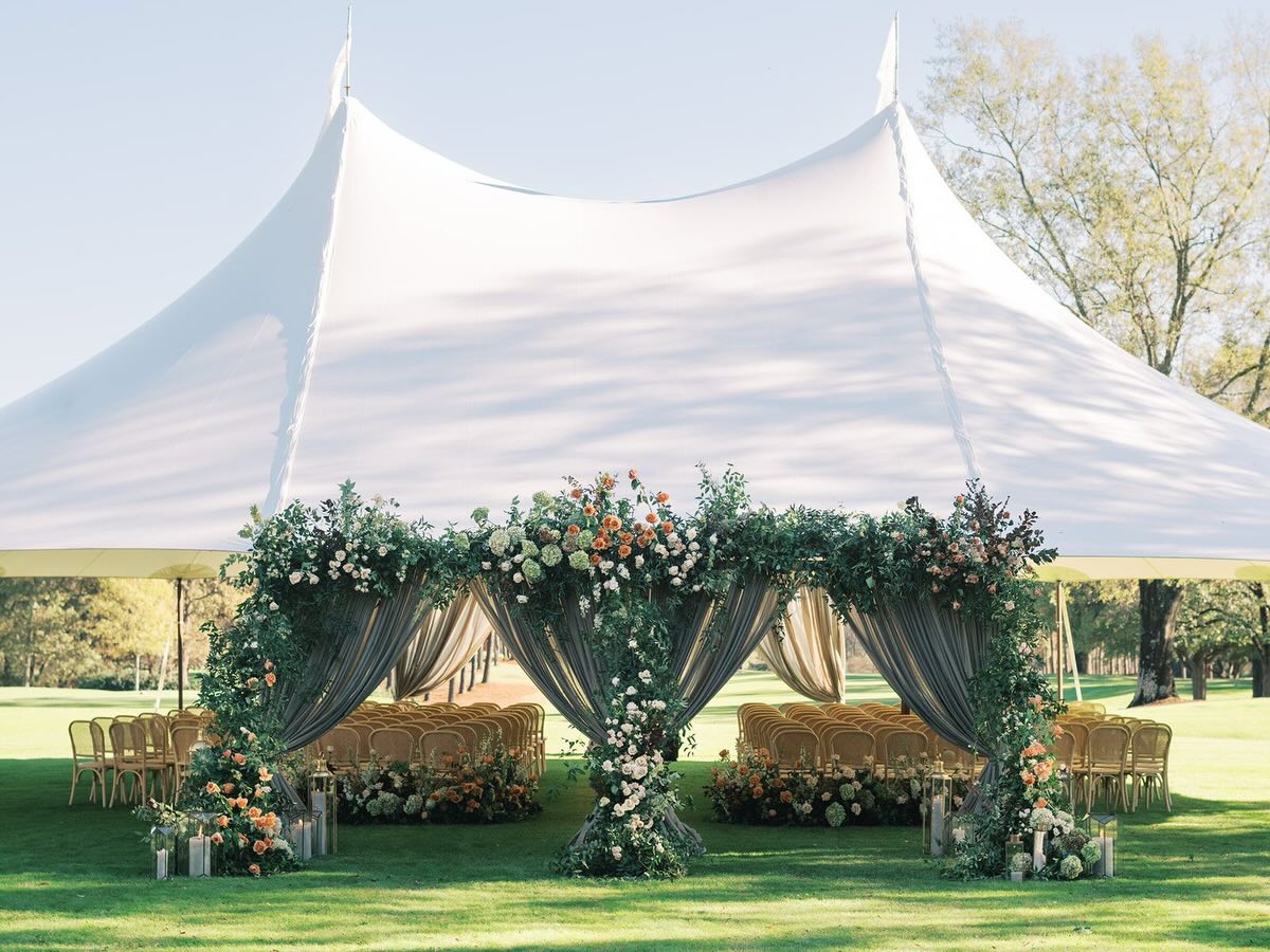 Forever began right here. The moment Abby + Steven walked through this breathtaking Party Tables draped entrance with Floressence Flowers florals, everything else faded away. There is something truly magical about the way drapery frames a moment. This one will live in our 🤍s for a long time.
Photographer: @demimabry
Planning & Design: @sohoeventdesign
Venue: @quailhollowcountryclub
Florals: @floressenceflowers
Ceremony tent: @partyreflections
Draping: @partytables_linensandrapery
Speciality rentals: @marthamydearrentals
Beauty: @jenniferabercrombiebeauty
Wedding gown: @amsaleweddings @ladiesoflineage
Tuxedo: @brooksbrothers
Stationery: @virilovelydesigns
Ceremony music: @deansduets
Cocktail hour music: @darrellhootsmusic
Band: @lovestruckparty
Linens: @bbjlatavola
Lighting: @illuminationclt
Custom barback shelves: @oxumeventdesign
Dance floor decal: @heritagedesigns
Custom ice cubes: @artisanicesculptures
Custom welcome wall: @knottyartisans
Cold sparks: @splitsecondsound
Cake: @mariannetayloecake
Live guest painter: @meliyaloosleart
Getaway car: @carolinaclassiccarrentals
Videographer: @dockhousedigital
#RealWeddings #LinkInBio #WeddingDesign #WeddingDrapery #WeddingTent
