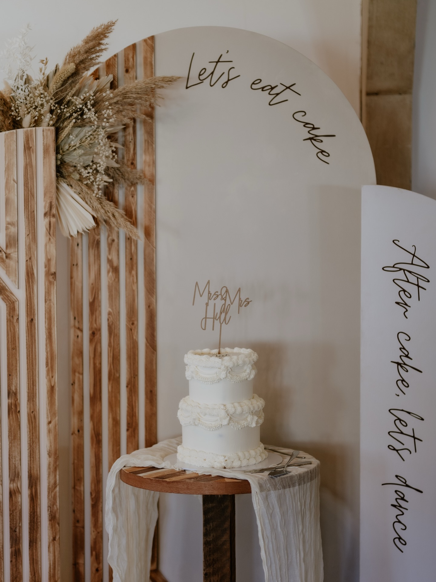 Let’s Eat Cake! Our curved board cake backdrop 🍰✨
The perfect way to make your cake stand out and create a little moment for those all-important photos. Featuring our “let’s eat cake” design, it adds a fun but stylish touch to your setup.
It’s simple, clean and works beautifully with your decor — turning your cake table into a proper feature rather than just a corner of the room.
If you’d like to add this to your day, drop us a message or take a look at our brochure 🤍
#WeddingCakeBackdrop #WeddingDecorUK #WeddingStyling #CakeTableInspo