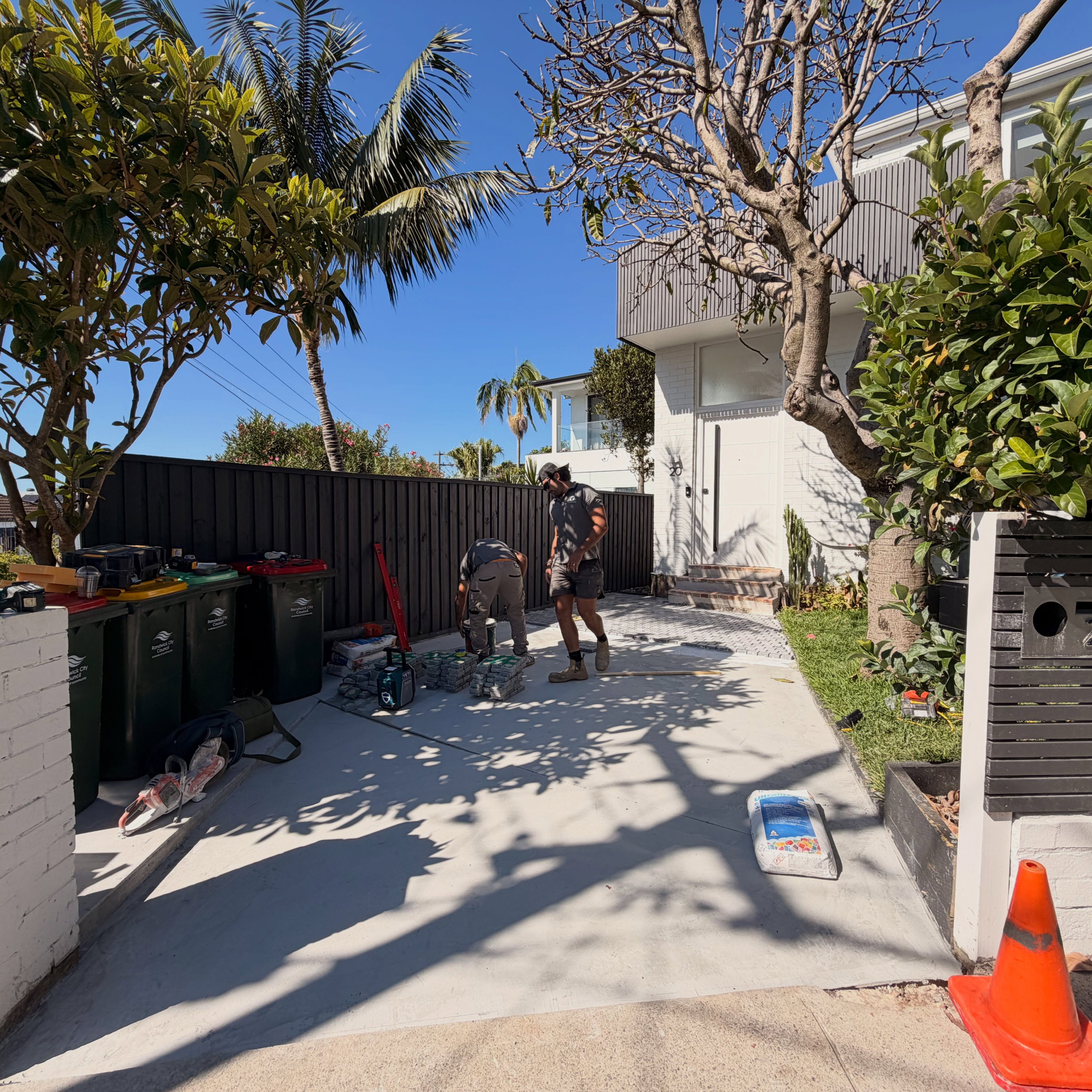 From dull slab to designer statement. Watch as we transform a standard concrete entry into a stunning cobblestone masterpiece, instantly elevating this home’s curb appeal and character.