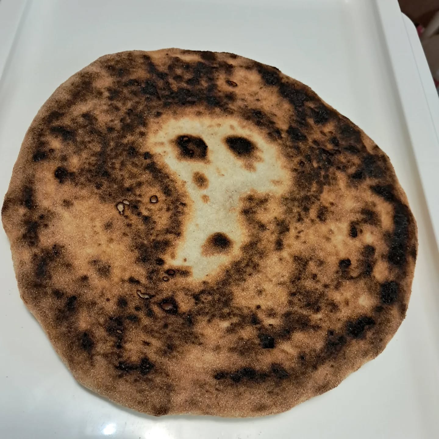 So...my pizza cook tonight looks like The Scream Should I put it up on ebay for charity?