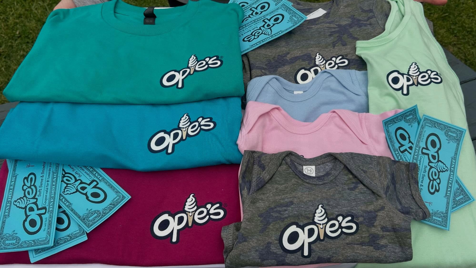 🚨 New color alert!! 🚨
Camo onesies and camo toddler tees are officially here and they are the CUTEST thing ever!! 🤩 Plus… we’re now selling adult tank tops too! 😍
Opies merch makes the perfect gift or souvenir, so stop by and grab yours today!
Sizes range from 6 month onesies all the way up to adult XXL!