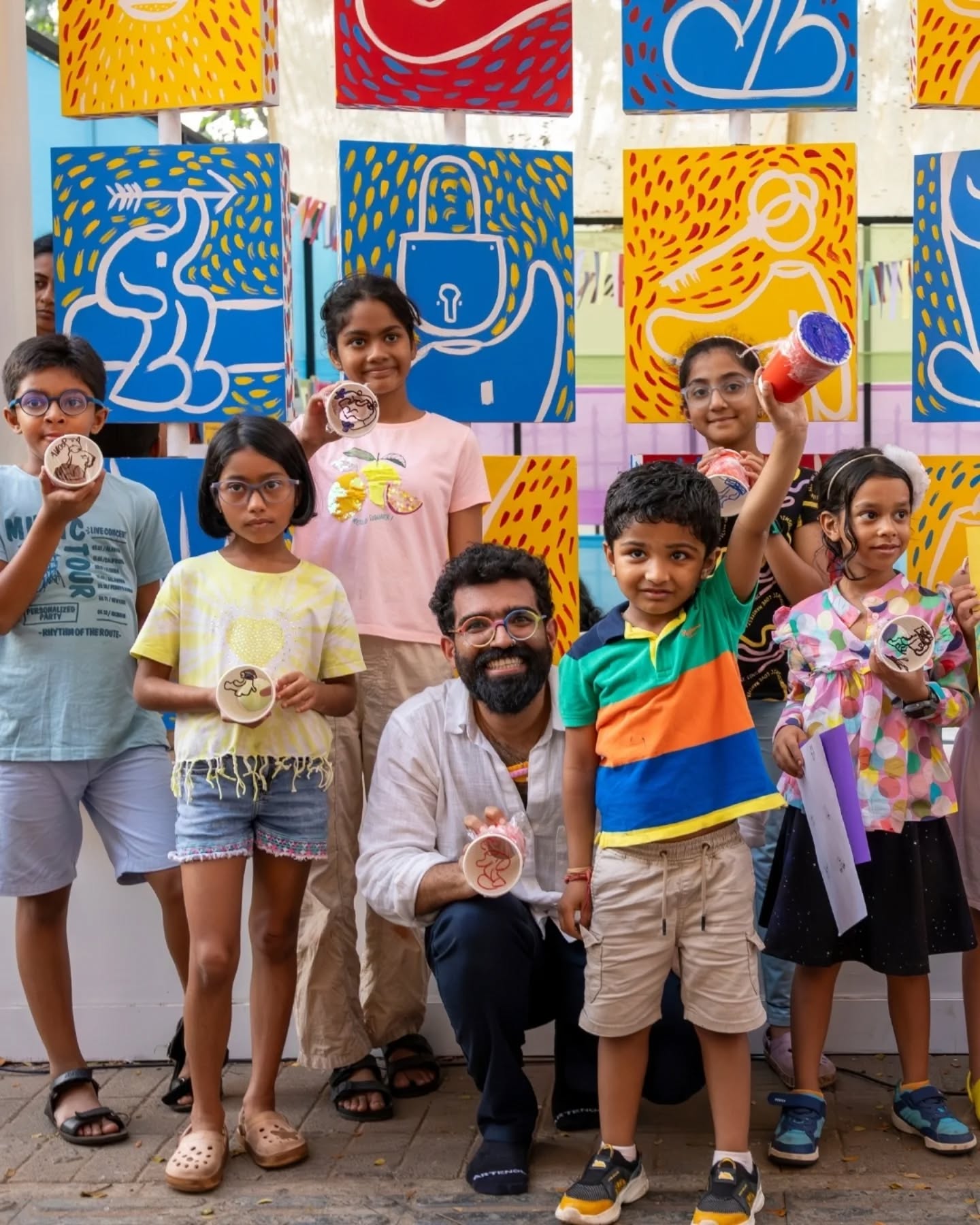 The Children’s Pavilion, part of Playscape and supported by RMZ Foundation, brought together a wide range of activities for younger audiences across the festival. 🧩✨
With contributions from Bookworm Goa, Studio Playhem, Children’s Art Studio (MOG), Arthy Muthanna Singh and RMZ Foundation, the space moved between reading, making and hands-on exploration. RMZ also hosted a workshop based on works from their collection, adding another layer to how children engaged with art.
Artist Ansh Kumar led a series of workshops where participants worked on pivoting canvases and experimented with painting using light, turning the space into one of constant activity and shared making. 🎨💡
Alongside this, a special book reading by Kalki Koechlin brought children and parents together for a quieter, collective moment within the pavilion. 📚
Across the days, the space saw strong participation, with kids settling in, moving around, coming back to things they liked and spending time on their own terms, and honestly, even the adults didn’t mind getting pulled into it.
A big thank you to RMZ Foundation for helping bring this space alive. 🙌