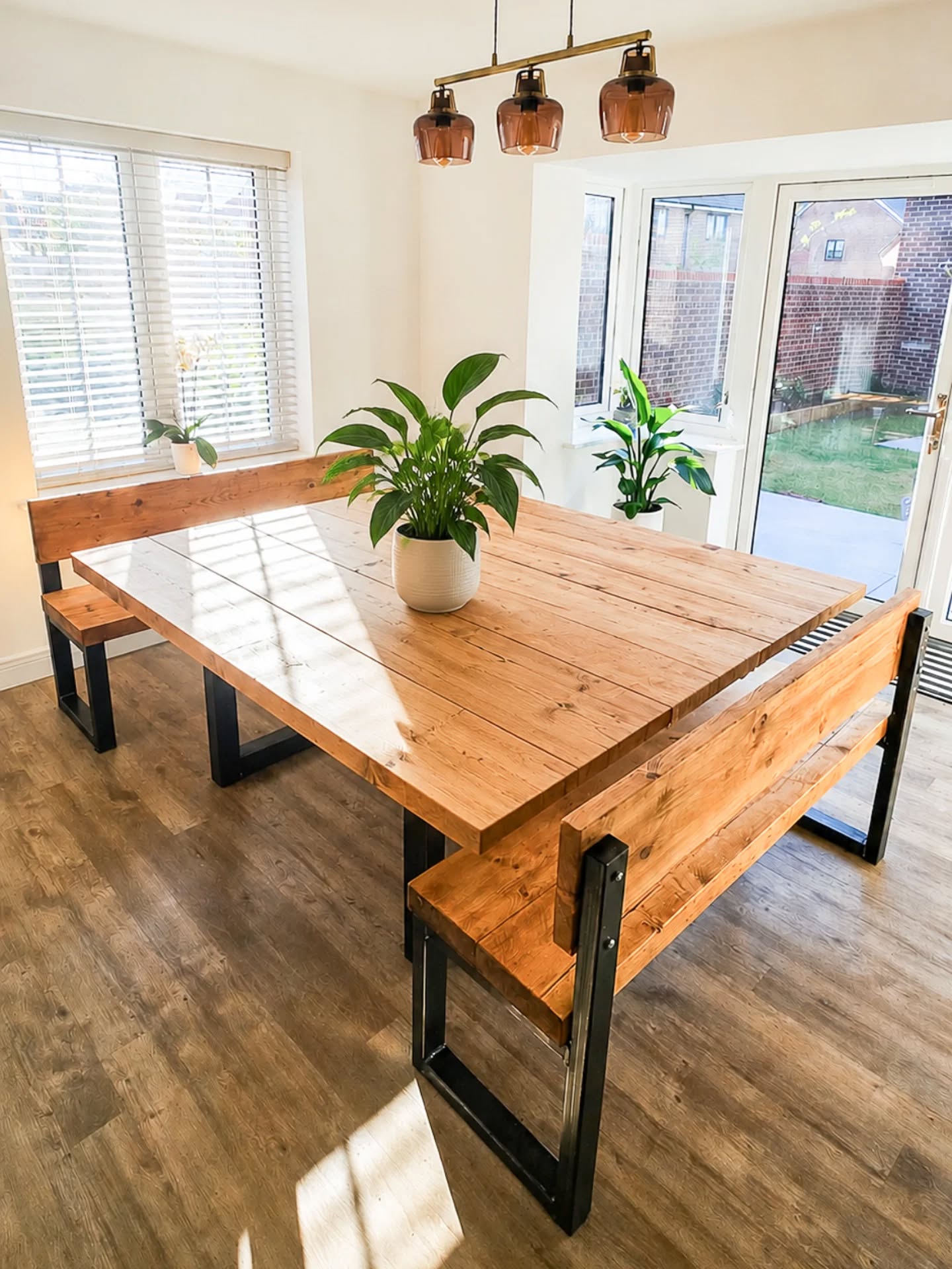Sun hitting just right on this reclaimed dining setup☀️
Our latest handmade solid wood table and benches, finished and styled in its new home. Simple, chunky, and built to last for years of family meals, coffees, and catch-ups🤎
.
.
.
.
#diningtable #furnitureinspiration #carpentry #homedecor #woodworking