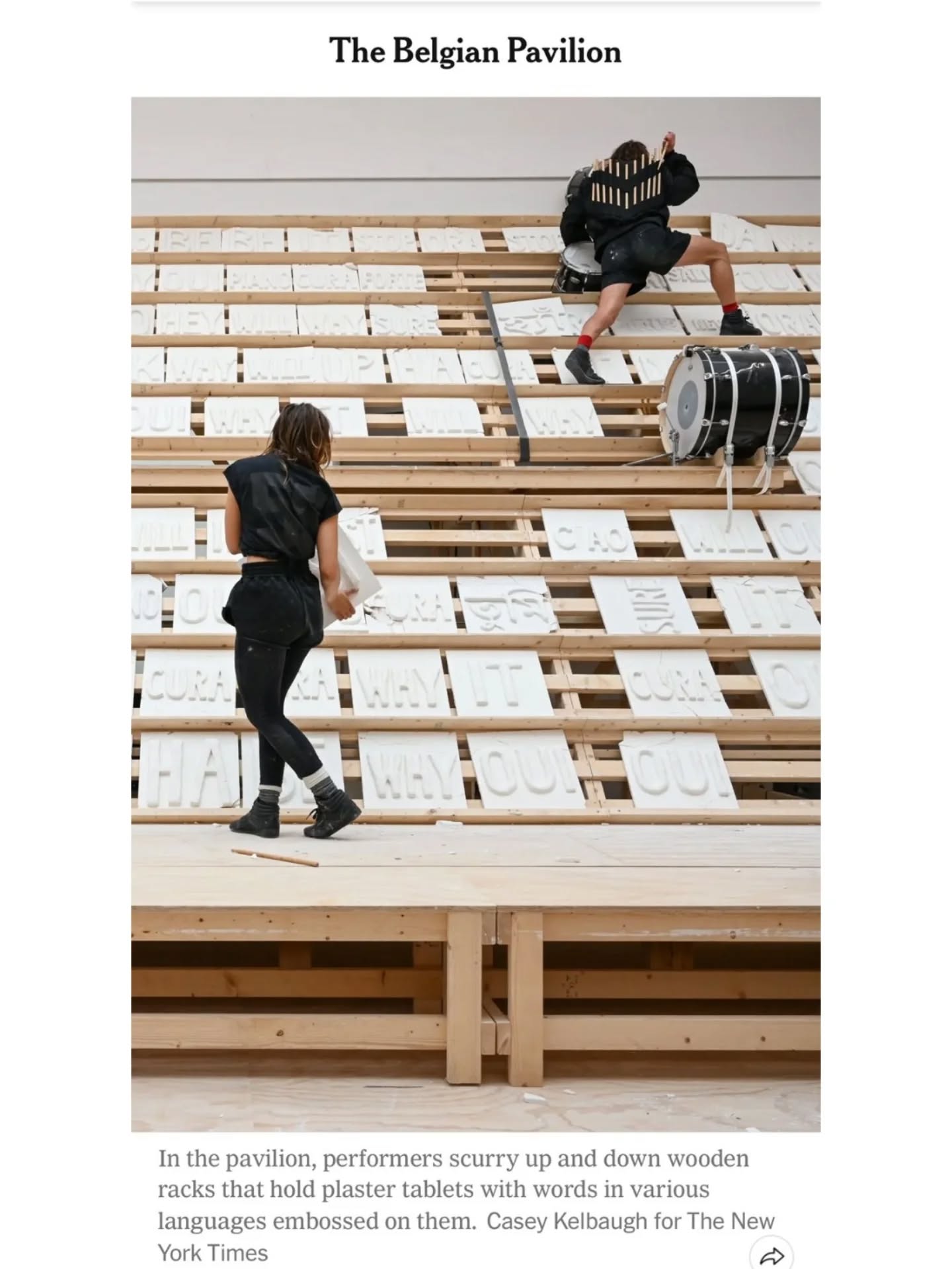 Congratulations to DAS 2023 collaborator Miet Warlop, curator Caroline Dumalin, MORPHO, Kanal-Centre Pompidou, Miet Warlop/Irene Wool, KASK & ArBA-EsA, and all contributing artists, performers, collaborators, partners and production teams on the presentation of IT NEVER SSST at the Venice Biennale 2026, recently recognised by The New York Times in its feature “7 Pavilions That Have the Venice Biennale Buzzing.”
Bangla language is the “minor key” from which the other languages emerged after its initial presentation at DAS 2023, as part of its current presentation at the Venice Biennale. In the image shared by The New York Times, it appears alongside Greek, Italian, French, and English, where it remains a grounding presence within the work’s multilingual field.
Blurring the boundaries between performance, sculpture, sound, and choreography, Warlop’s immersive installation transforms the Belgian pavilion into a vivid and constantly shifting environment charged with movement, tension, and theatricality. The work’s energetic rhythm and striking visual language have made it one of the standout presentations of this year’s Biennale.
Beginning with the repeated sound of “ssst” — a gesture of silence, tension, and restraint, the work gradually unfolds into a multitude of voices, languages, and emotional expressions carried through bodies in motion. Oscillating between concert, performance, and living sculpture, IT NEVER SSST becomes a continuously evolving space of transformation and collective experience.
Image 4-6: Sjoerd Tanghe
Image 7: Reinout Hiel