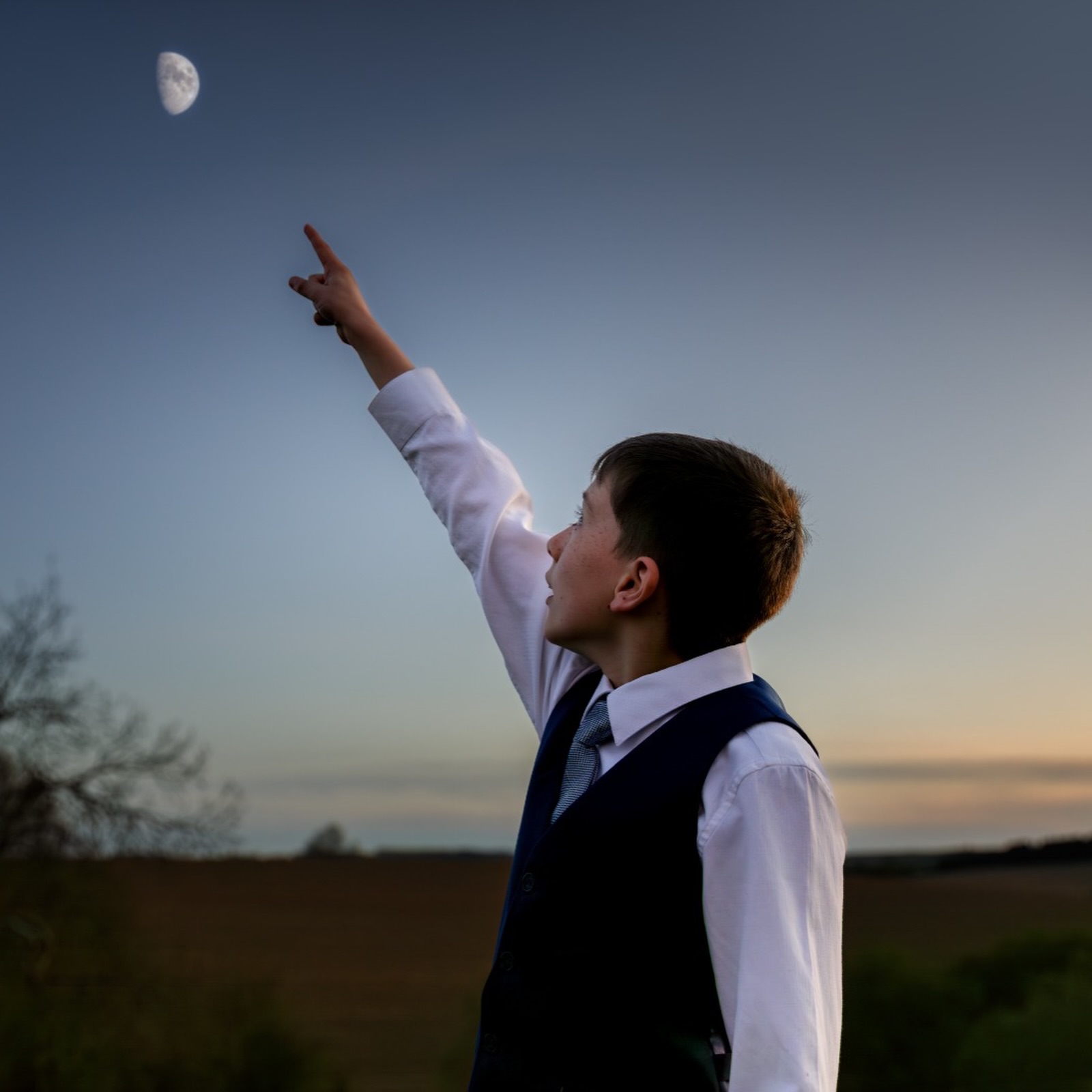 Jody and Adam’s wedding in Daventry had one of those little moments that sums up so much of what me and Emily do.
While Emily was off keeping the kids entertained and getting some fun photos, one of the little boys started chatting to me about space and pointed up at the moon. He asked if I liked space, so I said I’d try and take a photo of it so he could have a look on the back of my camera.
When he zoomed in and saw all the detail, his reaction was basically pure magic.
It was such a small moment, but it says a lot. We don’t just turn up and take photos from the side lines. We get involved, chat to your guests, keep the kids happy, and make the whole experience feel fun and relaxed for everyone there.
Sometimes that means getting the big important moments. Sometimes it means making a little boy’s evening by showing him the moon on the back of a camera.
And honestly, that matters just as much.
If you’re planning a wedding and want photographers who will blend in, muck in, and genuinely connect with the people there, me and Emily might be exactly what you’re looking for.