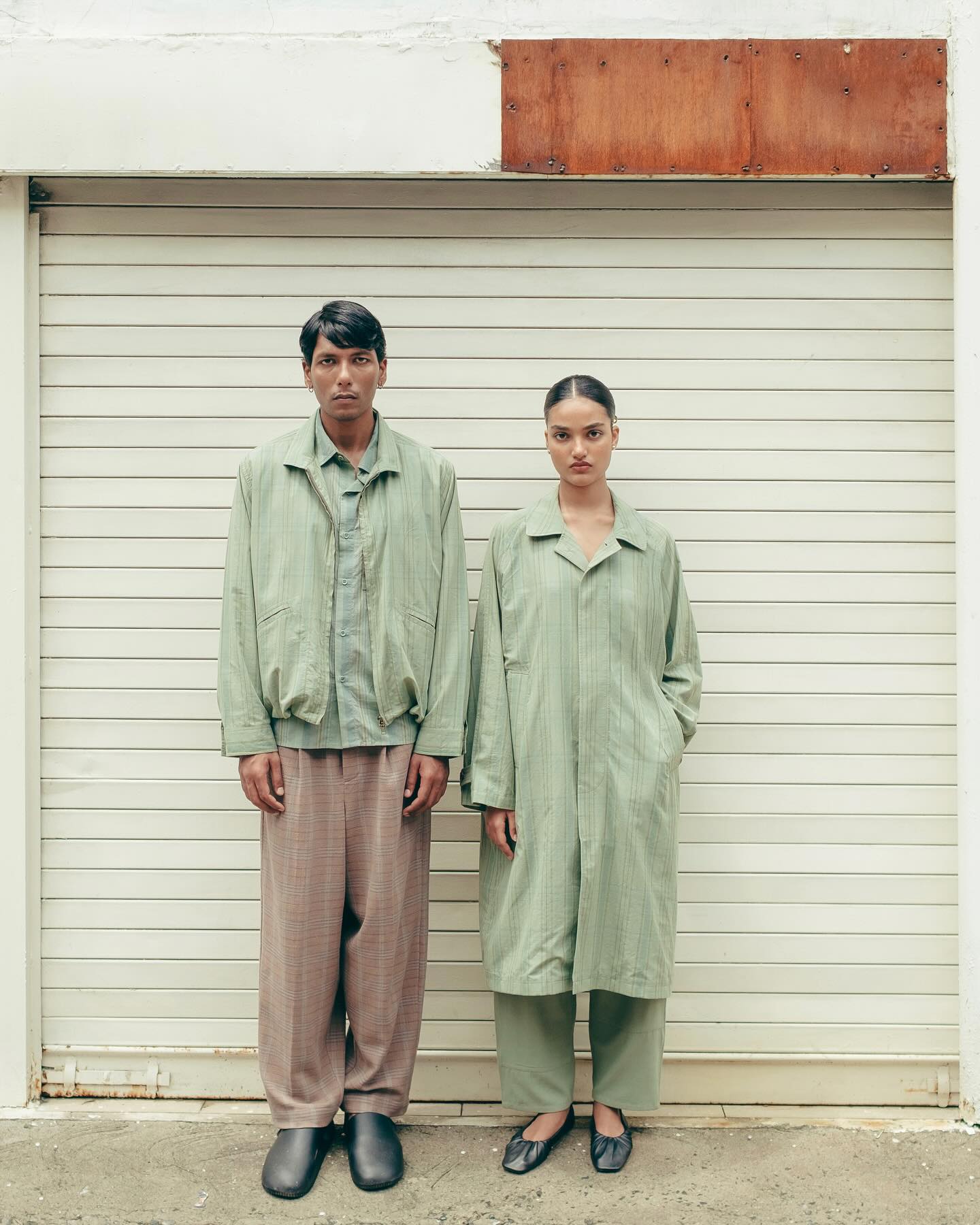 Introducing OSHADI, a truly pioneering seed-to-sew brand and collective producing timeless collections shaped by a system of soil, fibre, people and process. Founded in Tamil Nadu, India by Nishanth Chopra in 2016, @oshadi_collective works directly with local farmers and artisans to cultivate regenerative cotton and create ethically made, plant-dyed garments. This brand is sustainable in every sense; each step of garment production - including harvesting, spinning, dyeing, weaving, block-printing and sewing - is completed within a short distance of Oshadi’s farm and other small-holdings in rural Southern India. Honouring not only artisans, weavers, and tailors but also the ground from which the cotton grows, the brand fosters regenerative farming practices and seeks to preserve indigenous crafting techniques by ensuring fair, equitable wages.
●
Gaurav wears the Rooted Jacket, crafted from 100% regenerative cotton voile, with single pleat trousers hand-woven from 100% GOTS organic cotton.
Parineet wears the Nain Coat, crafted from 100% regenerative cotton voile and recycled cotton Asari trousers #ss26
●
Photography: @harnoorjuneja
Art direction: @toby_etc
Styling: @jahnvibansal
Model: @gauravgharu_ and @parineetkaur06
Hair and Makeup: @realkarma_mua @hairby_simremth
●
#oshadi #oshadicollective #zerowaste #organicfashion #organiccotton #regenerativefashion #seedtosew #luxury #luxuryfashion #handembroidery #handloom #plantdyes #sustainableclothing #artisanal #heritage #heritagetextiles #textiles #circularfashion #sustainablefashion #ethicalfashion #biodiversity #organicfarming #LuxuryIndianFashion #MadeInIndia #schroroom #representedbyschroroom #appointments #parisfashionweek