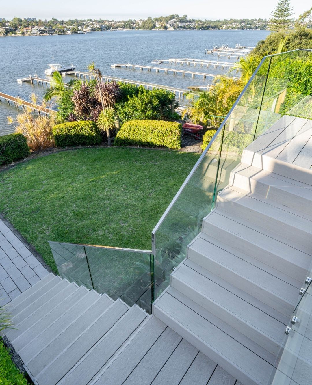 Life Outdoors isn't just about creating beautiful decks and pergolas, we also build stairs and balustrading to create transitional spaces and keep you safe while you enjoy life outdoors!
This staircase in Oyster Bay was actually built right over the top of an existing decayed staircase, creating a beautiful way to transition from the deck to the waterfront.
