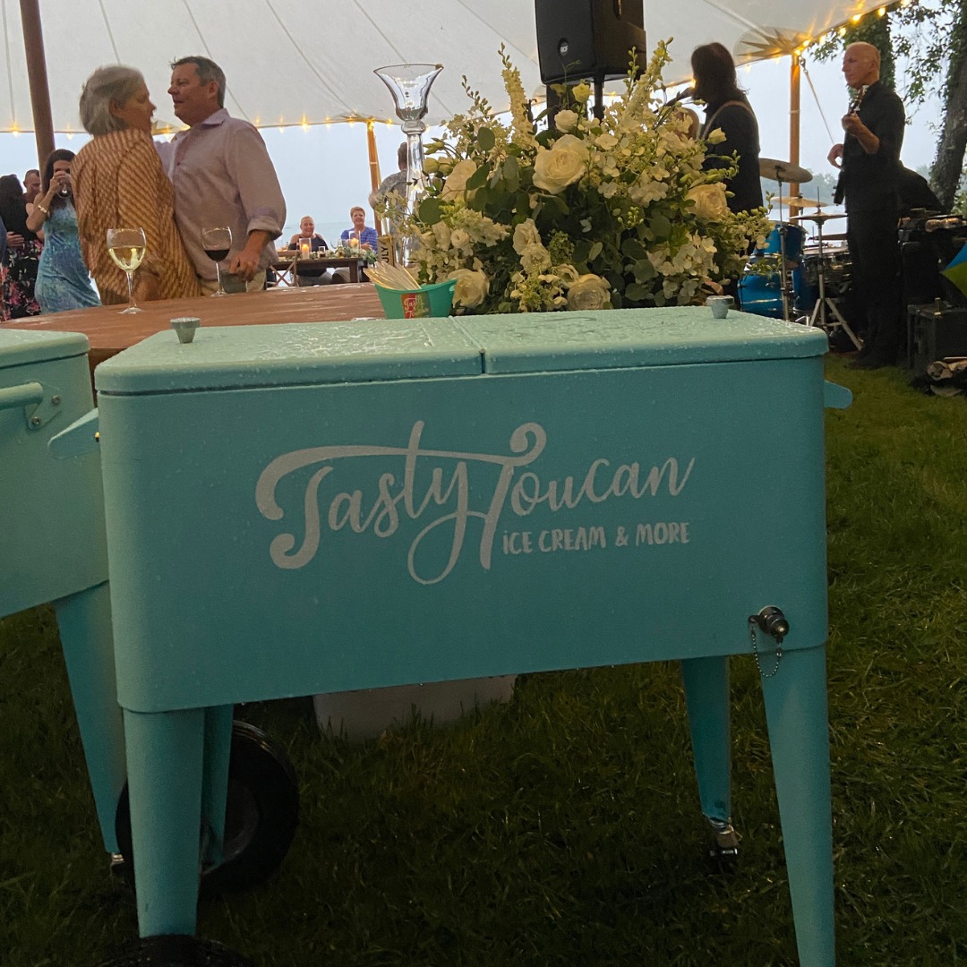 "I used Tasty Toucan to cater ice cream as dessert for my son's wedding this past weekend. They were amazing! They brought their cute ice cream cart and hand scooped for the guests which was such a nice touch. Everyone loved all the flavors. It was wonderful that the guests had choices of flavors and cones or cups. They even brought fruit flavored popsicles for those who were dairy free. (I didn't even consider this) The owner of this ice cream shop is so wonderful to work with! I would give this business ten stars if I could. On a hot summer evening, celebrating with all your family and friends Tasty Toucan is the cherry on top of your party!!'