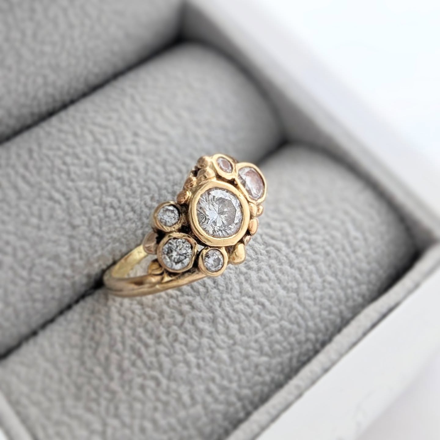 The "Venus" has now been officially launched on the website. This is a sextuplet set diamond ring, featuring a total of 1.2CT of ethical diamonds and either 18ct or 22ct Gold. I
If you are looking for something special and unique then this is your ring. It's an heirloom piece and each one is individually made to order, making each one slightly different and unique. Want blue and green diamonds instead of white? No problem, that's the beauty of handmade we can tailor each ring to your individual style.
#goldengagementring
#engagementringideas #handmadejewellery
#custommadering