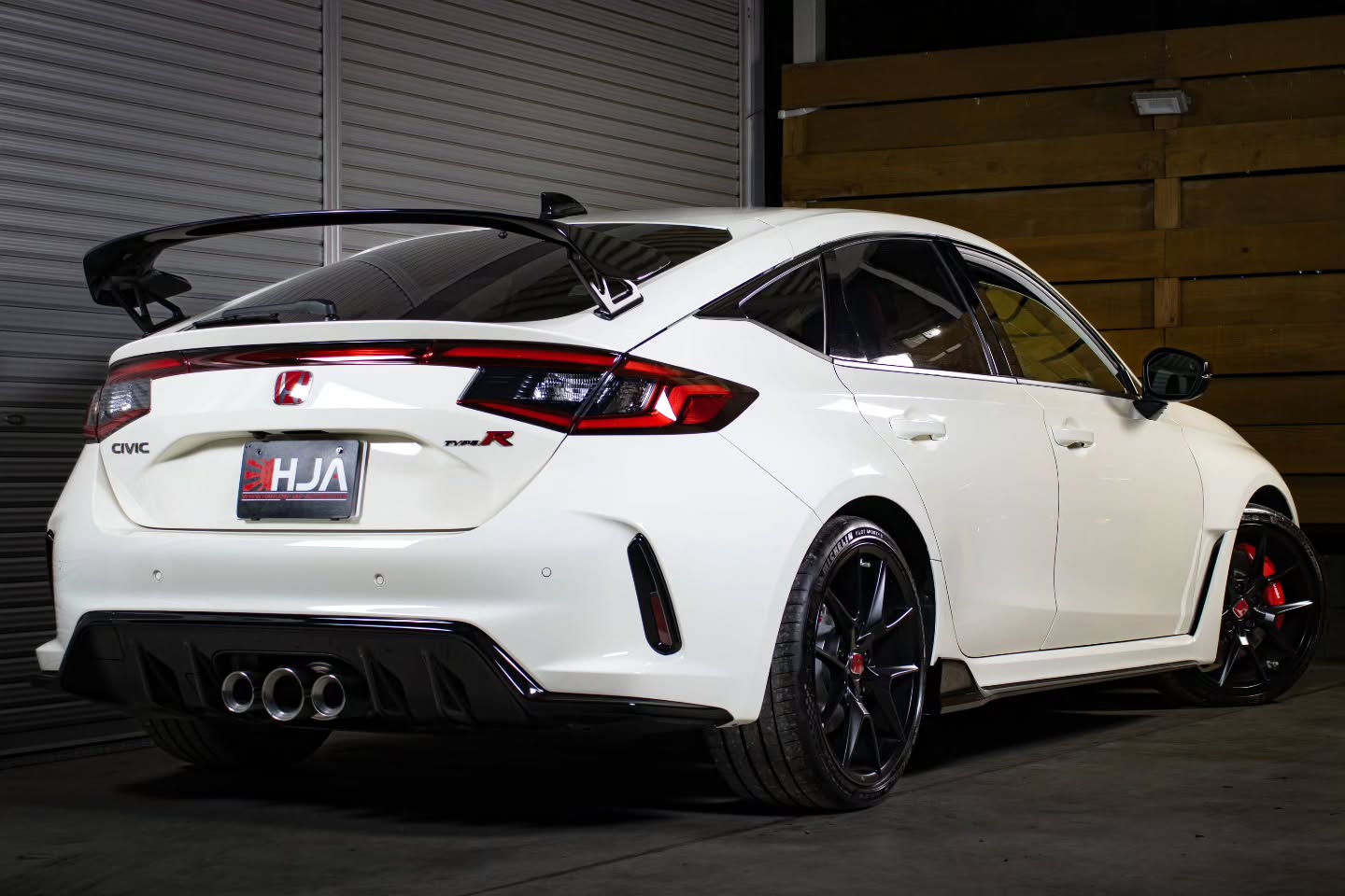 ARRIVING SOON – HJA
11/2025 Honda Civic Type R FL5 (JDM)
Championship White
A virtually brand-new example of Honda’s flagship performance hatchback, presented in exceptional condition with just 187km from new.
This vehicle achieved the highly desirable Japanese auction grade S A, indicating a near-new condition vehicle, and has had just one owner in Japan before being listed at auction for the first time.
Secure now with a 10% deposit until ready for collection.
Factory Specification
Performance & Drivetrain
• 2.0-litre turbocharged VTEC K20C1 engine
• 330PS / approx. 325bhp (JDM specification)
• 420Nm torque
• 6-speed manual transmission
• Helical limited-slip differential
• Front-wheel drive performance chassis
• Adaptive damper suspension system
• Rev-match control
• Selectable Comfort / Sport / +R drive modes
Chassis, Wheels & Brakes
• Lightweight aluminium bonnet
• Dual-axis MacPherson front suspension
• Multi-link rear suspension
• Brembo 4-piston front brake calipers
• 19-inch factory Type R alloy wheels
• Michelin Pilot Sport 4S tyres
• Triple-centre exhaust system
• Functional aerodynamic package with rear wing
Interior & Technology
• Type R bucket seats in red/black suede-effect fabric
• 10.2-inch digital instrument cluster
• Honda LogR performance datalogger system
• Factory navigation system
• TV tuner
• Wireless Apple CarPlay & Android Auto
• Dual-zone climate control
• Wireless phone charging
• Push-button start
• Smart entry system
• Bose premium sound system
Safety & Driver Assistance
• Honda Sensing safety suite
• Adaptive cruise control
• Lane keep assist
• Collision mitigation braking system
• Blind spot monitoring
• Rear cross traffic alert
• Multi-angle rear camera
Additional Information
• One owner from new
• First time offered at Japanese auction
• Warranty booklet included
• Owner’s guidebook included
• Spare key included
The FL5 Type R is widely regarded as one of the finest front-wheel-drive performance cars ever produced, combining track-focused engineering with everyday usability and classic Honda precision.
This vehicle will be supplied UK-registered and ready for the road.