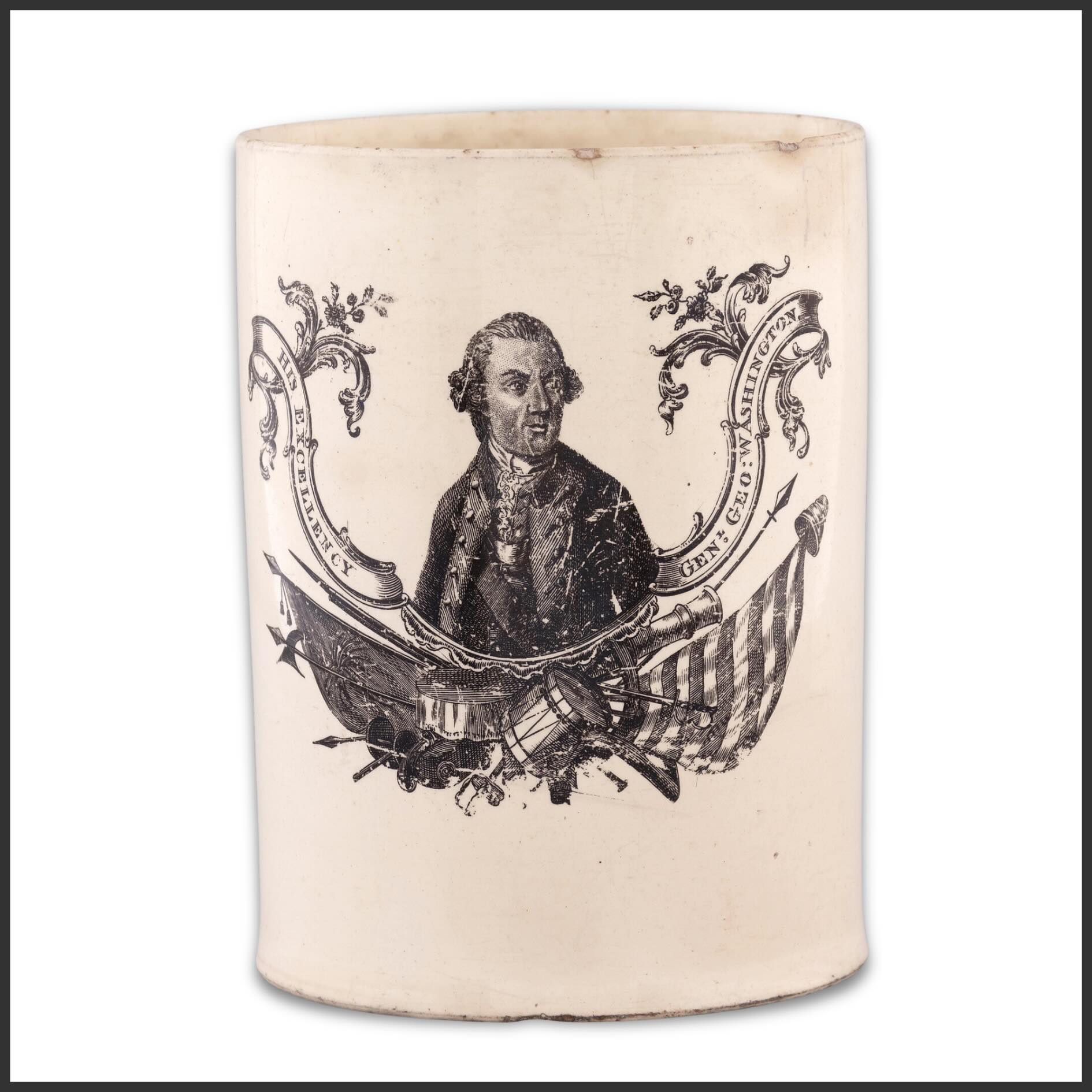 Weekend preview from Independence Unfolded: America at 250
A rare Liverpool creamware tankard transfer-printed with a portrait of George Washington beneath the banner “His Excellency,” a title associated with his role as Commander-in-Chief at the close of the American Revolution. Produced in England circa 1785 for the American market, the tankard reflects the immediate transatlantic demand for Washington imagery in the years following independence.
The present example represents a distinctive Washington portrait within the corpus of Anglo-American ceramics and is illustrated in David Arman’s Anglo-American Ceramics (W.4), where it serves as the plate example.
Featured in the forthcoming catalog Independence Unfolded: America at 250, opening June 12.
#Gallery76Americana #GeorgeWashington #Creamware #Americana #America250