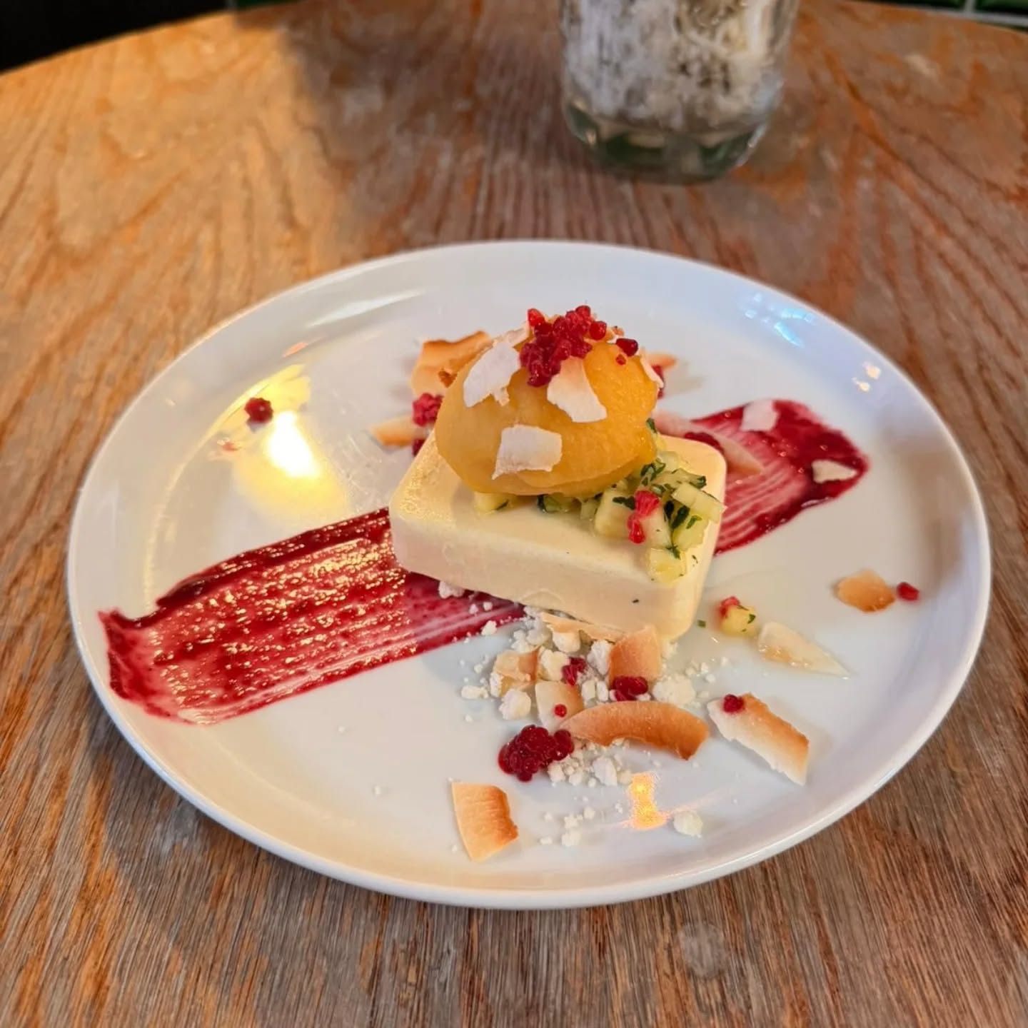 Mango Parfait, White Chocolate Soil, Mango Sorbet, Raspberry Coulis, Toasted Coconut, Pineapple & Mint Salsa. The perfect summer dessert ready for a Sunny Bank Holiday Weekend 🌞 #summerfood #eattherainbow #berrygood