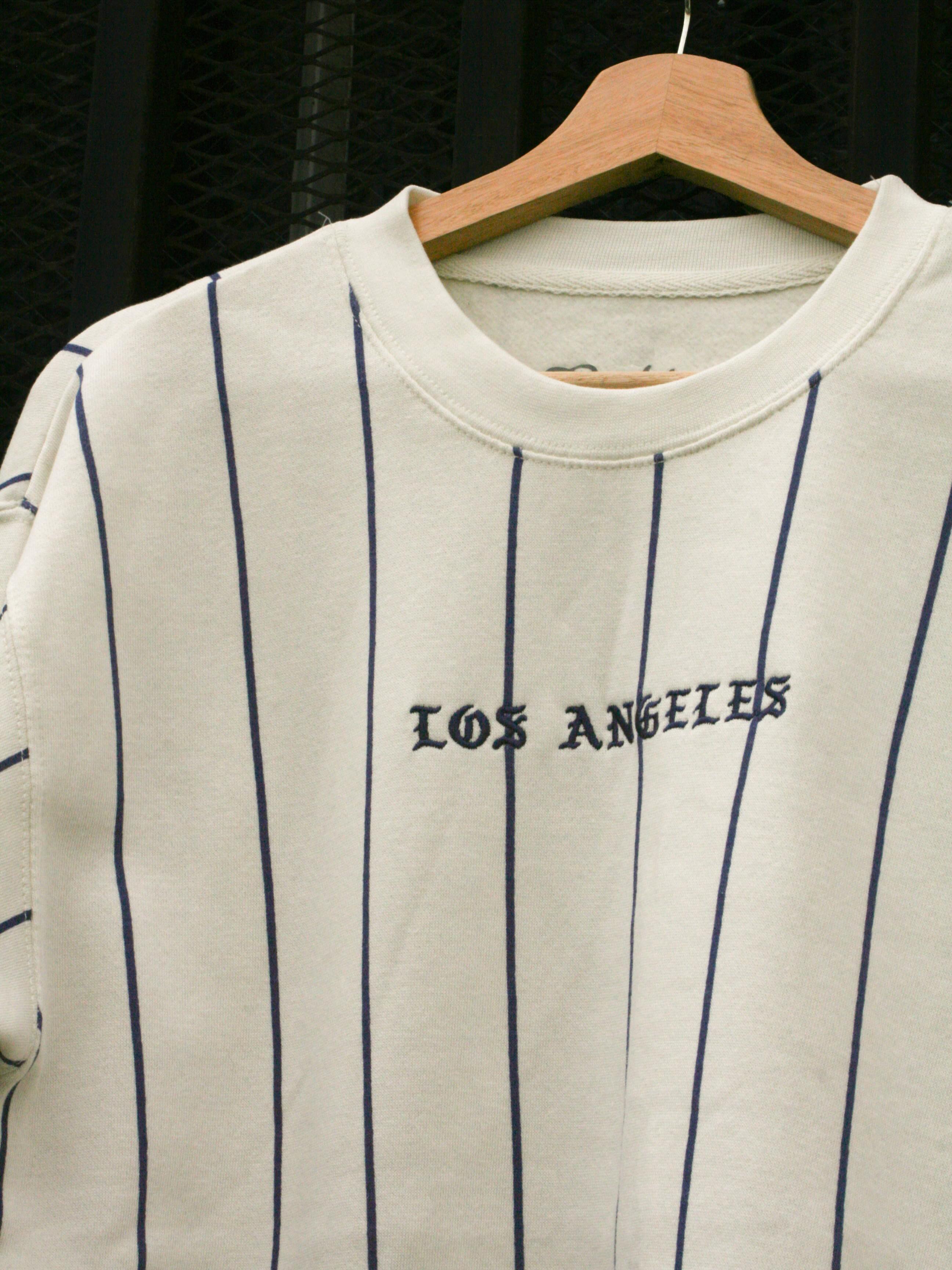 Wearing a sweatshirt in the heat builds character 😮💨☀️
New LA sweatshirt available now. For anyone who refuse to let summer ruin the outfit 😎🌴
Who else keeps a sweater on year-round? 👀
#eightyeightbrand #losangeles #newarrivals #mensfashion #summer