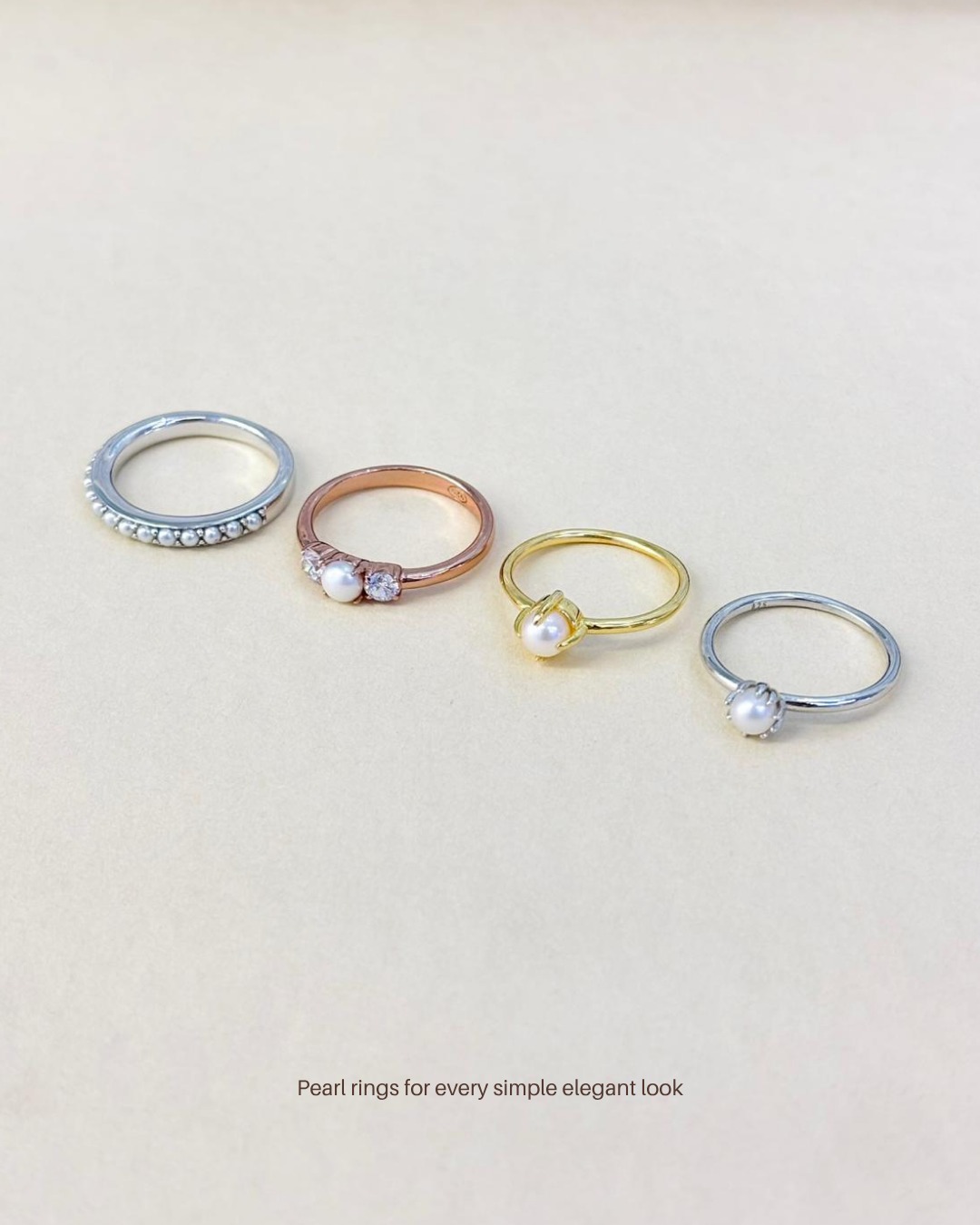 Minimal pearl rings, perfect for everyday elegance.
