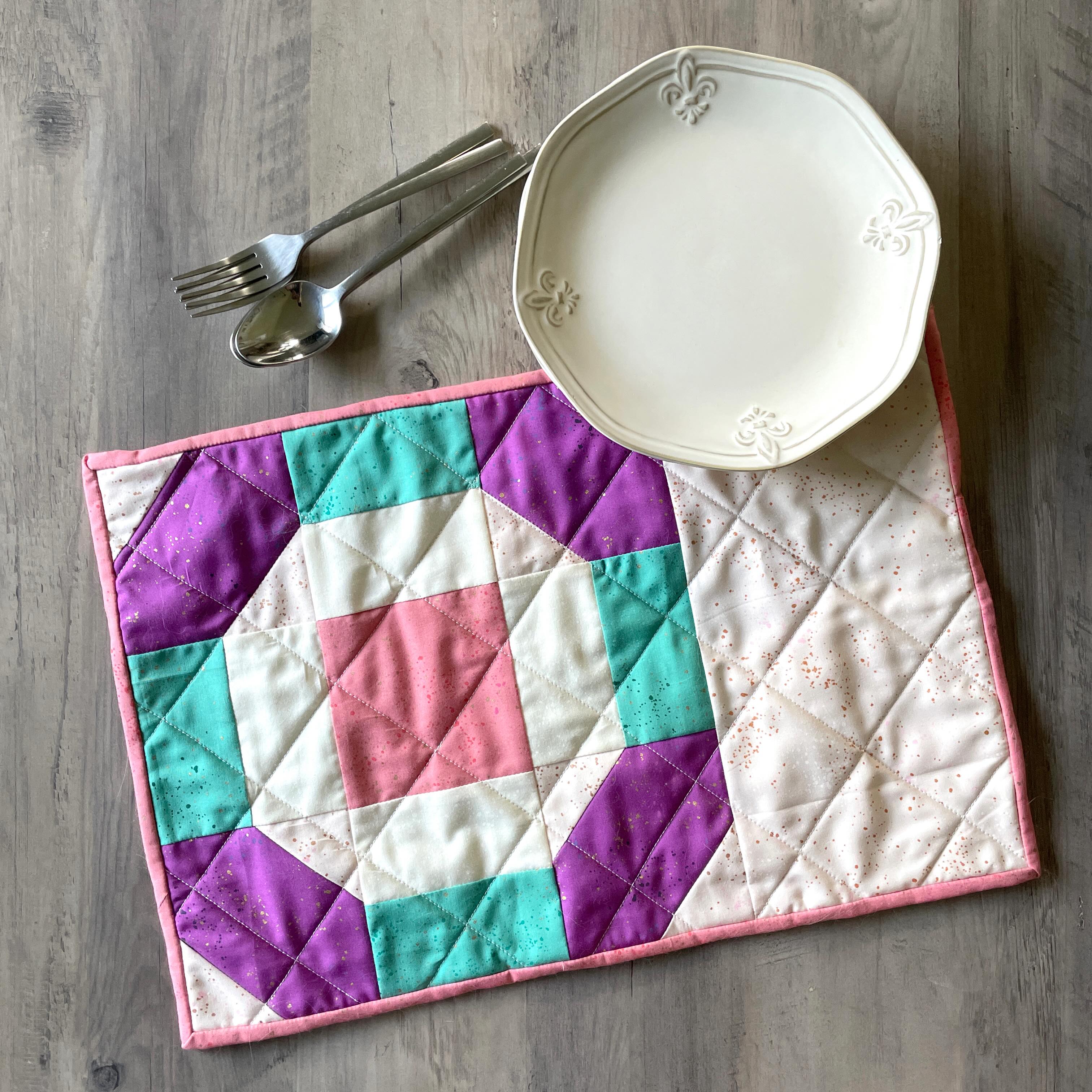 Set a stylish table with a basic set of place mats. The block provides the perfect placement for a round plate. 🍽️
This place mat pattern is available exclusively to my BOM participants! And sign-ups are still open! Join the BOM at the link in my bio! (sewing is always more fun with friends!) 🧵 🎉
#hhsbom2026 #HappyHourStitches #hhstitches #hhsplacemat #rubystarsociety