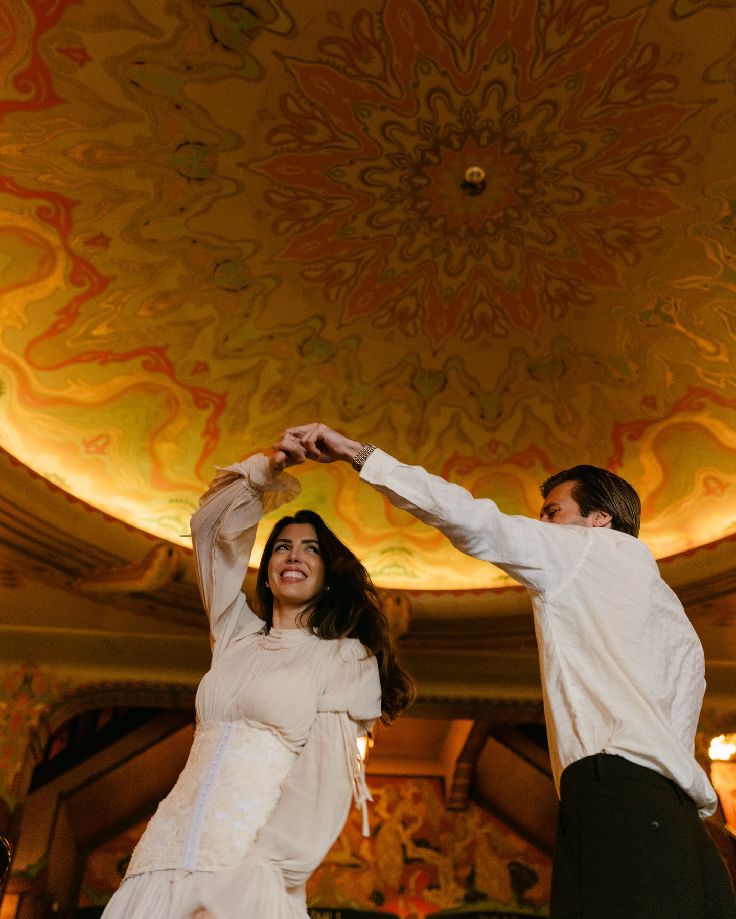 Bruna & Barend are a love story that persisted through life’s obstacles. 🇧🇷🇳🇱Like a true Capricorn and Taurus duo, they navigated it all with patience, grounding, and grew stronger with every step. Four years later, we photographed their love at Pathe Tuchinski, Amsterdam’s most vibrant neighbourhood. The cinema was the setting of some of their very first date. This week, celebrating a full-circle moment before saying “I do, yes!” we photographed in the city where they fell in love. ✨
Worked together with @vicentefilms
Dress @tigoficial_